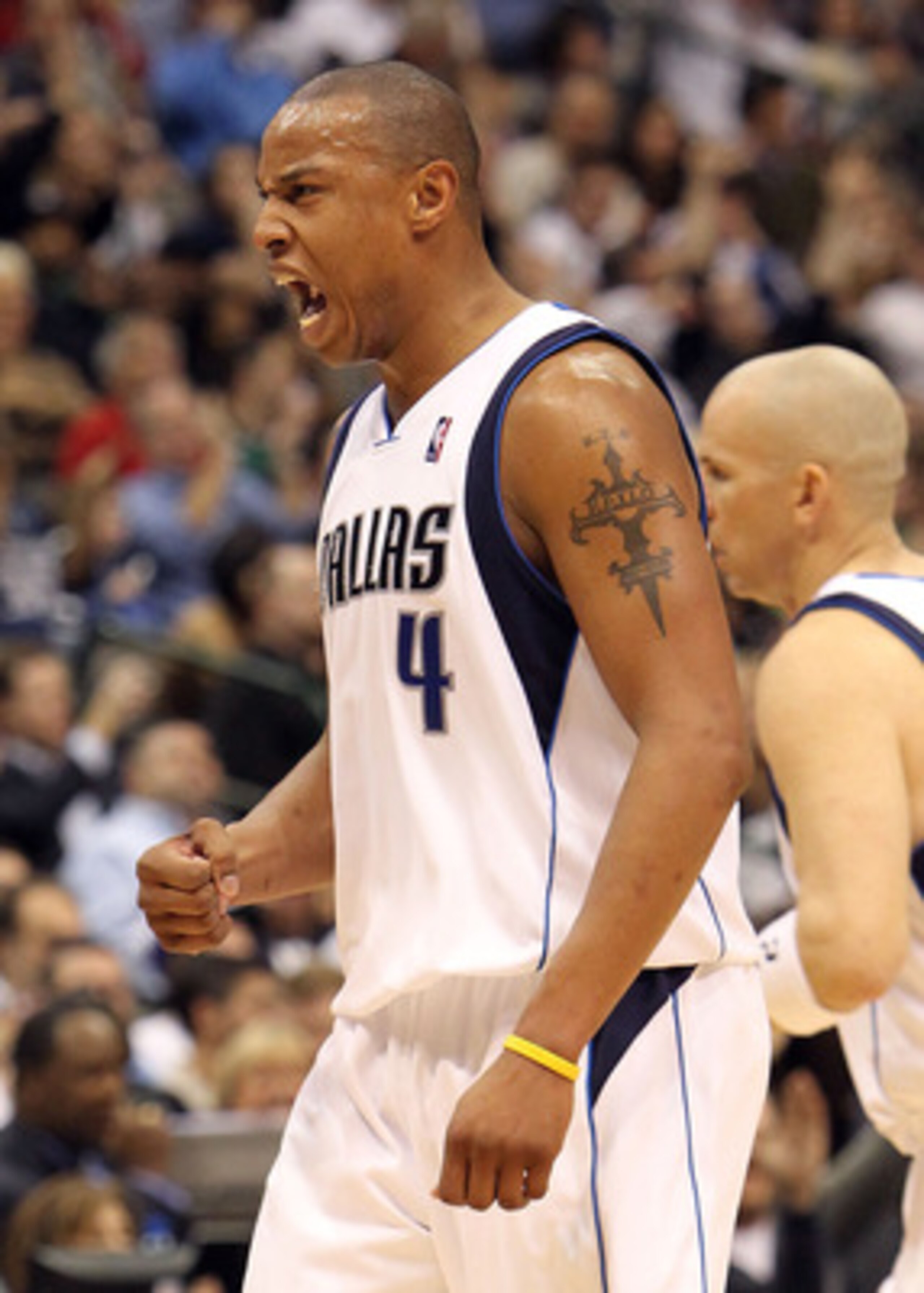 DALLAS - FEBRUARY 20:  Forward Caron Butler #4 of the Dallas Mavericks reacts during play against the Miami Heat on February 20, 2010 at American Airlines Center in Dallas, Texas.  NOTE TO USER: User expressly acknowledges and agrees that, by downloading 