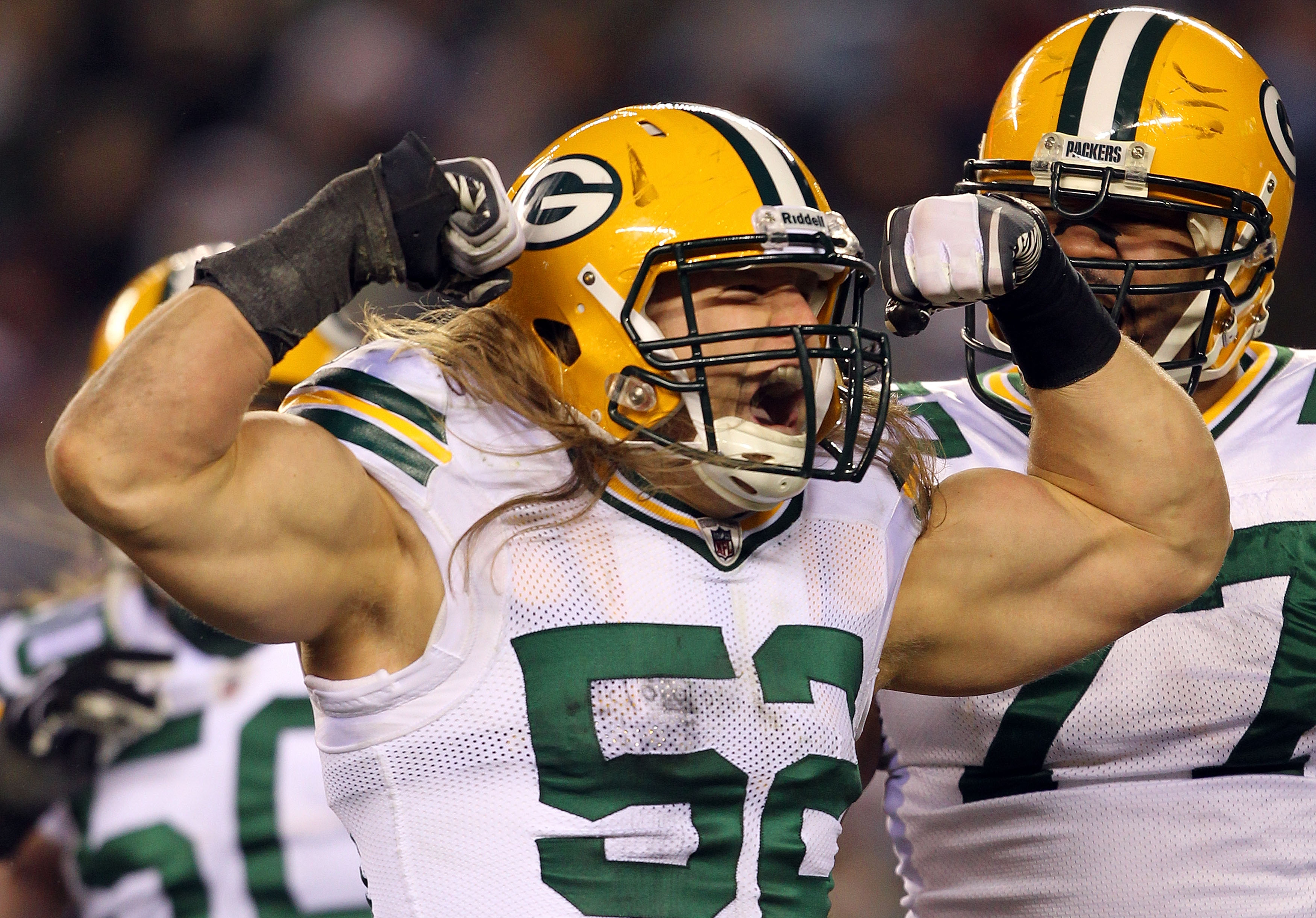 PHILADELPHIA, PA - JANUARY 09:  Clay Matthews #52 of the Green Bay Packers celebrates after a sack against the Michael Vick #7 of the Philadelphia Eagles during the 2011 NFC wild card playoff game at Lincoln Financial Field on January 9, 2011 in Philadelp