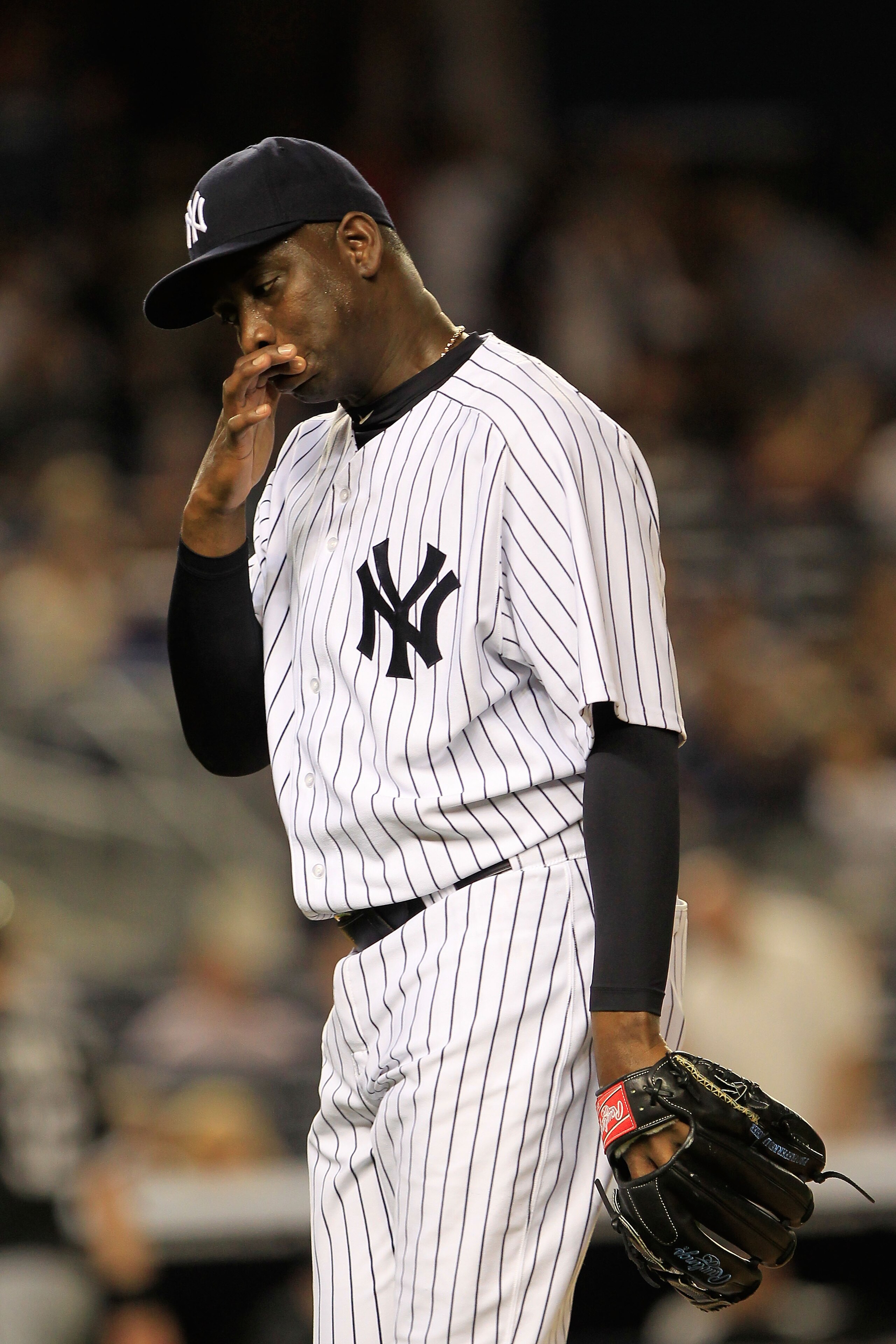 NEW YORK, NY - APRIL 26: Rafael Soriano #29 of the New York Yankees walks to the dugout after the top of the eighth inning against the Chicago White Sox at Yankee Stadium on April 26, 2011 in the Bronx borough of New York City.  (Photo by Chris Trotman/Ge