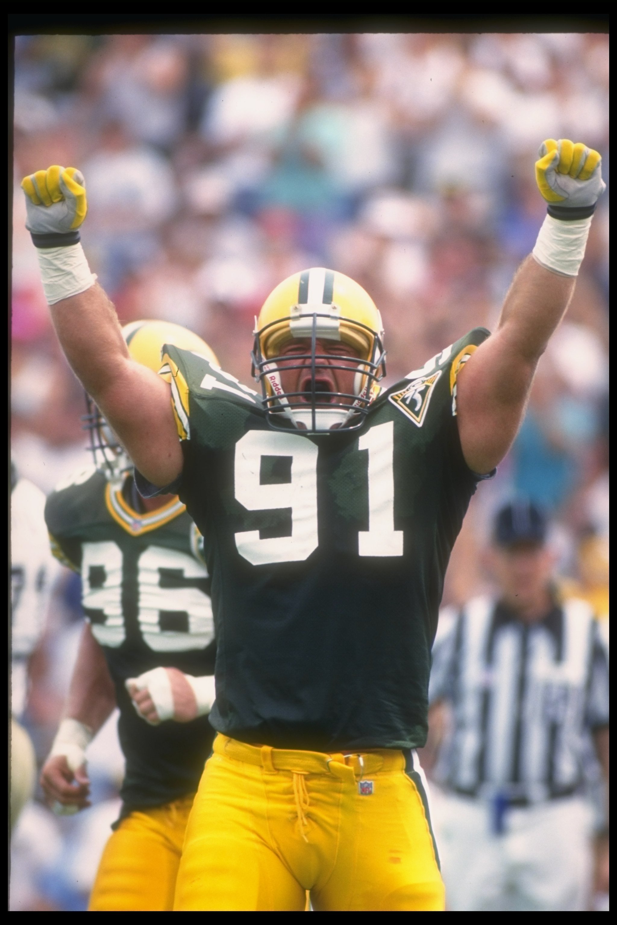 14 Aug 1993:  Linebacker Brian Noble of the Green Bay Packers celebrates during a pre-season game against the New Orleans Saints at Camp Randall Stadium in Madison, Wisconsin.  The Saints won the game, 26-17. Mandatory Credit: Jonathan Daniel  /Allsport