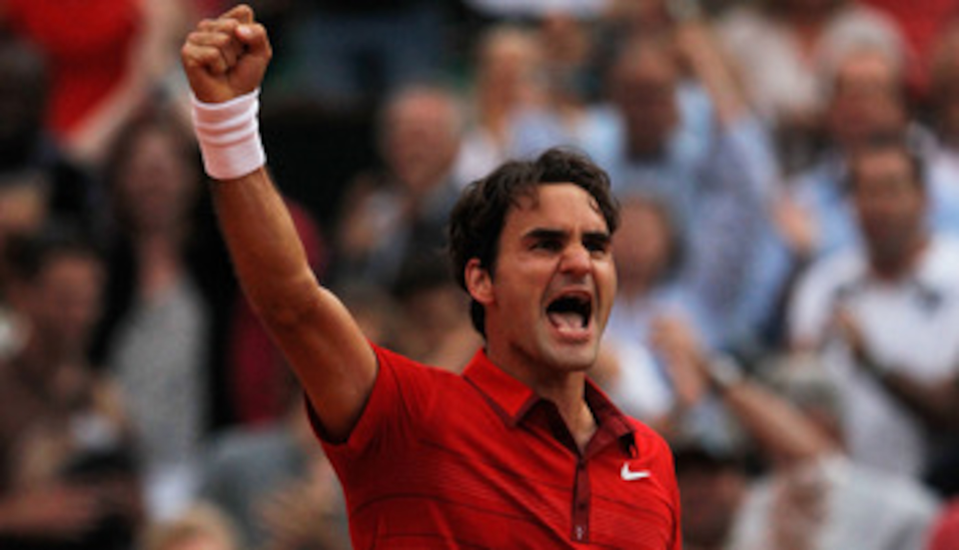 PARIS, FRANCE - JUNE 03: Roger Federer of Switzerland celebrates match point during the men's singles semi final match between Roger Federer of Switzerland and Novak Djokovic of Serbia on day thirteen of the French Open at Roland Garros on June 3, 2011 i PARIS, FRANCE - JUNE 03: Roger Federer of Switzerland celebrates match point during the men's singles semi final match between Roger Federer of Switzerland and Novak Djokovic of Serbia on day thirteen of the French Open at Roland Garros on June 3, 2011 i