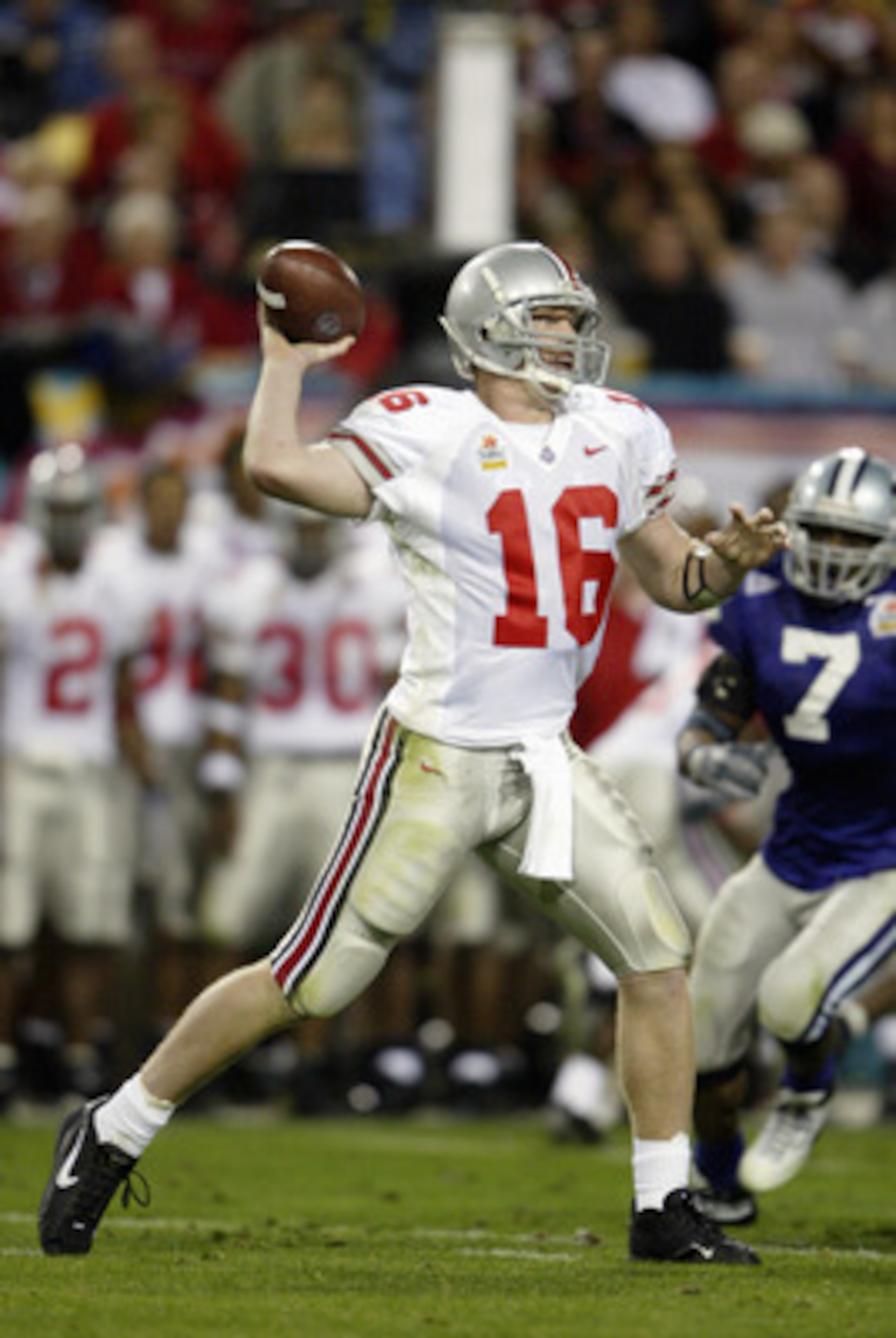 TEMPE, ARIZONA - JANUARY 2: Quarterback Craig Krenzel #16 of Ohio State Buckeyes passes the football during the game against the Kansas State Wildcats in the Tostitos Fiesta Bowl on January 2, 2004 at Sun Devil Stadium in Tempe, Arizona. The Buckeyes def TEMPE, ARIZONA - JANUARY 2: Quarterback Craig Krenzel #16 of Ohio State Buckeyes passes the football during the game against the Kansas State Wildcats in the Tostitos Fiesta Bowl on January 2, 2004 at Sun Devil Stadium in Tempe, Arizona. The Buckeyes def