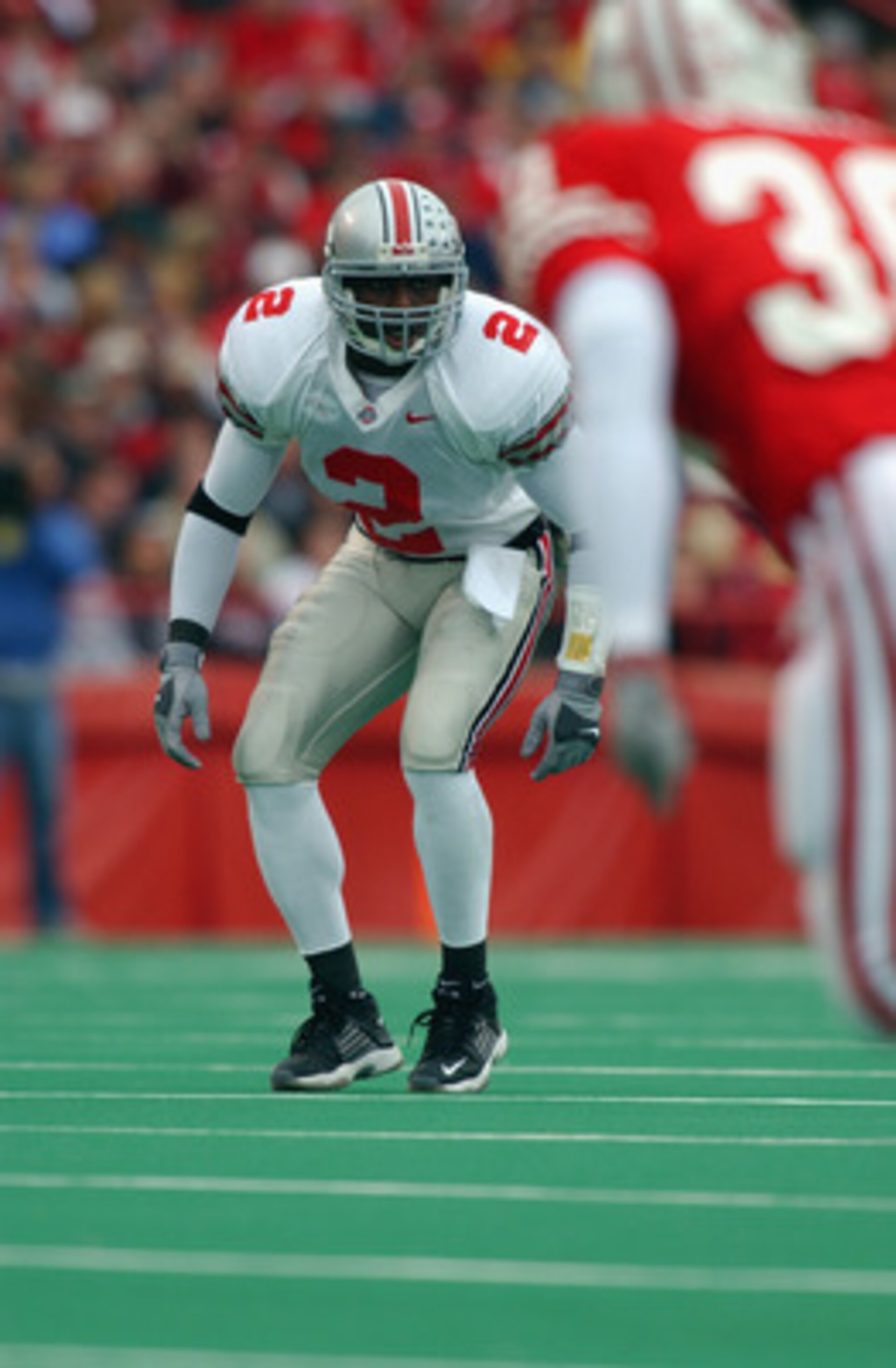 MADISON, WI - OCTOBER 19: Safety Mike Doss #2 of the Ohio State Buckeyes watches the play develop during the Big Ten Conference football game against the Wisconsin Badgers at Camp Randall Stadium on October 19, 2002 in Madison, Wisconsin. The Buckeyes w MADISON, WI - OCTOBER 19: Safety Mike Doss #2 of the Ohio State Buckeyes watches the play develop during the Big Ten Conference football game against the Wisconsin Badgers at Camp Randall Stadium on October 19, 2002 in Madison, Wisconsin. The Buckeyes w