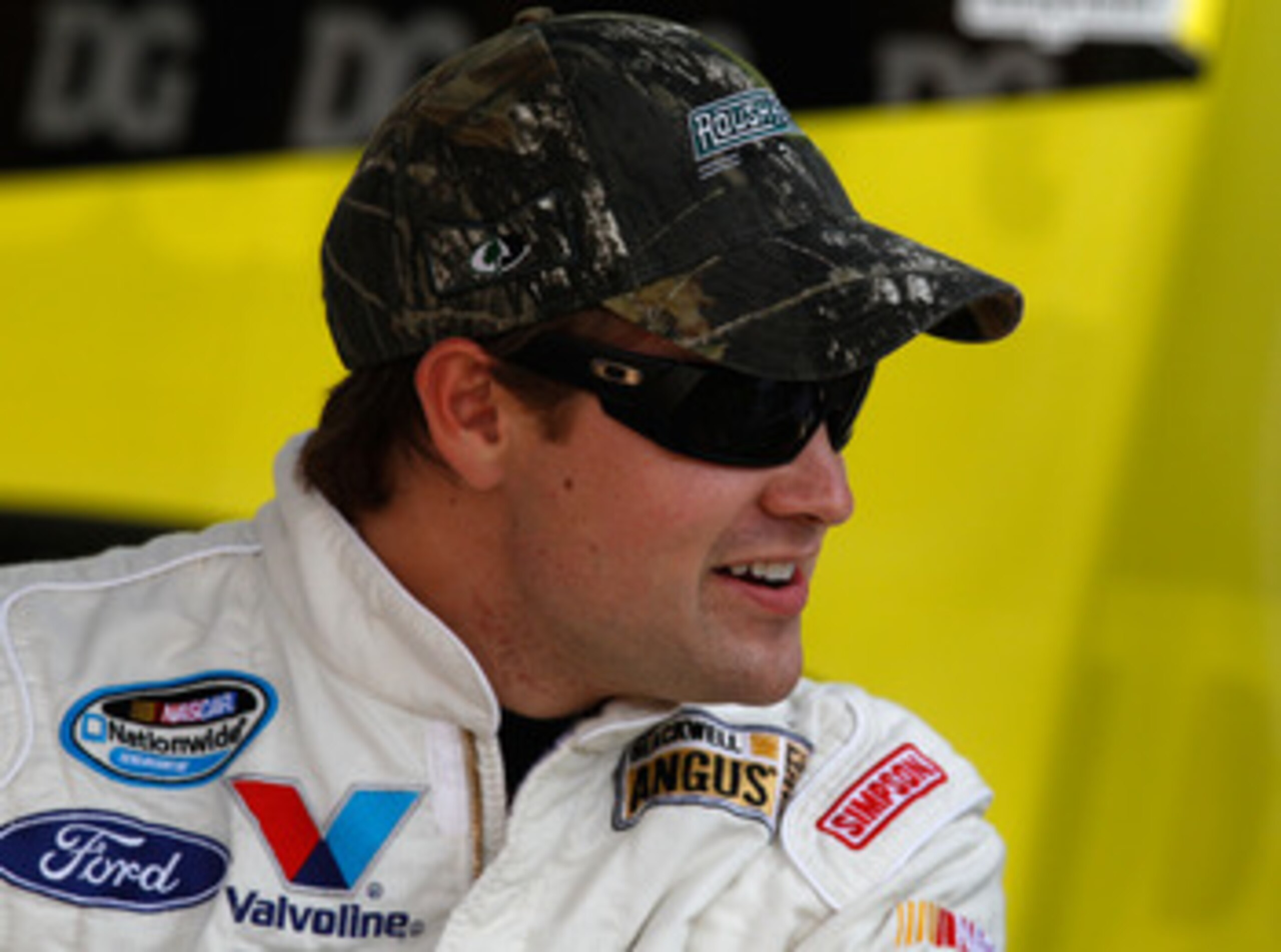 FORT WORTH, TX - APRIL 07:  Ricky Stenhouse Jr., driver of the #6 As Seen On TV Easy Feet Ford, stands in the garage during practice for the NASCAR Nationwide Series O'Reilly Auto Parts 300 at Texas Motor Speedway on April 7, 2011 in Fort Worth, Texas.  (