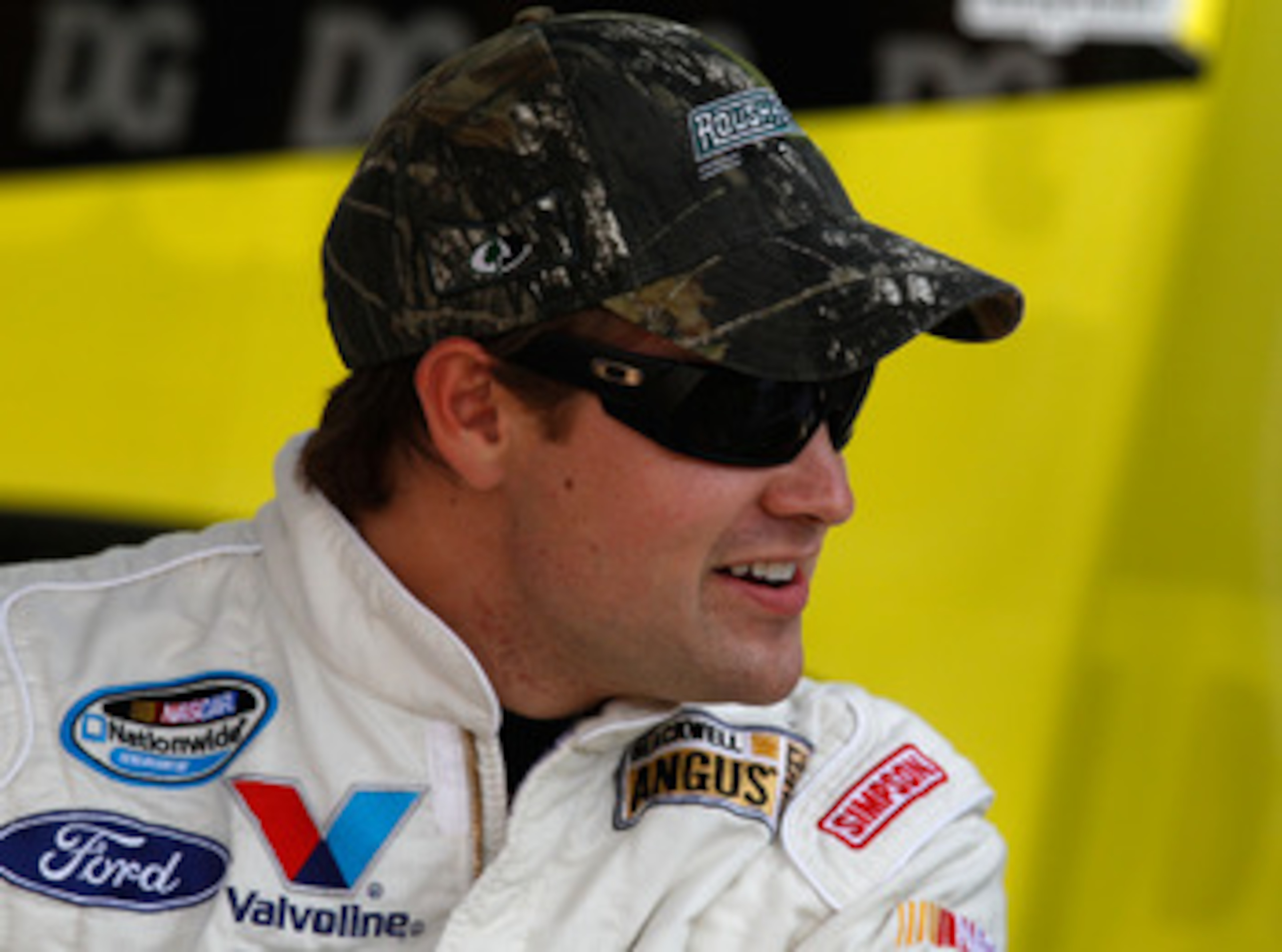 FORT WORTH, TX - APRIL 07:  Ricky Stenhouse Jr., driver of the #6 As Seen On TV Easy Feet Ford, stands in the garage during practice for the NASCAR Nationwide Series O'Reilly Auto Parts 300 at Texas Motor Speedway on April 7, 2011 in Fort Worth, Texas.  (