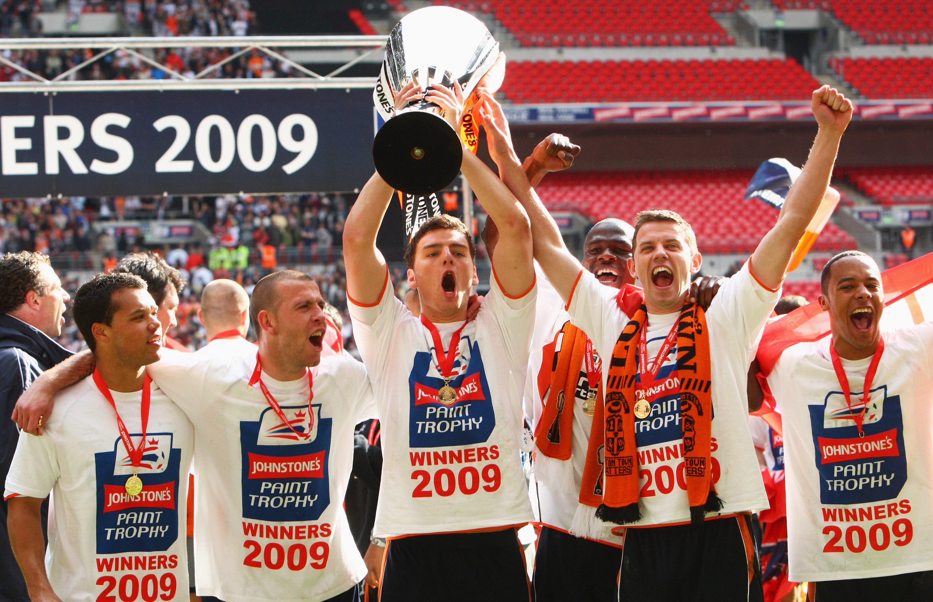 LONDON - APRIL 05: Chris Martin (C) with the trophy with team mates after victory during the Johnstone's Paint Trophy Final match between Luton Town and Scunthorpe United at Wembley Stadium on April 5, 2009 in London, England.  (Photo by Phil Cole/Getty I
