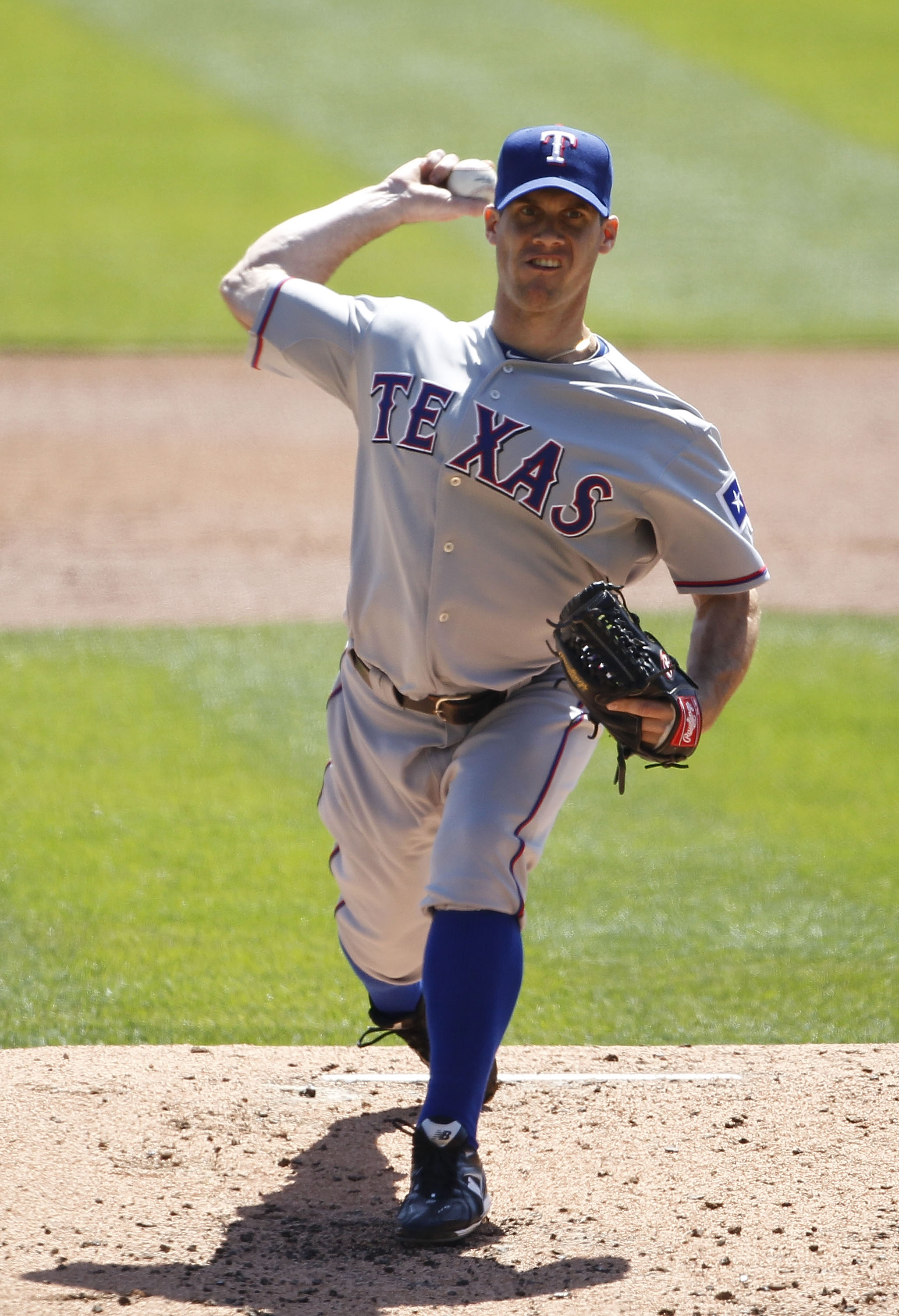 DETROIT - APRIL 13:  Dave Bush #47 of the Texas Rangers pitches in the first inning of the game against the Detroit Tigers at Comerica Park on April 13, 2011 in Detroit, Michigan. The Tigers defeated the Rangers 3-2.  (Photo by Leon Halip/Getty Images)