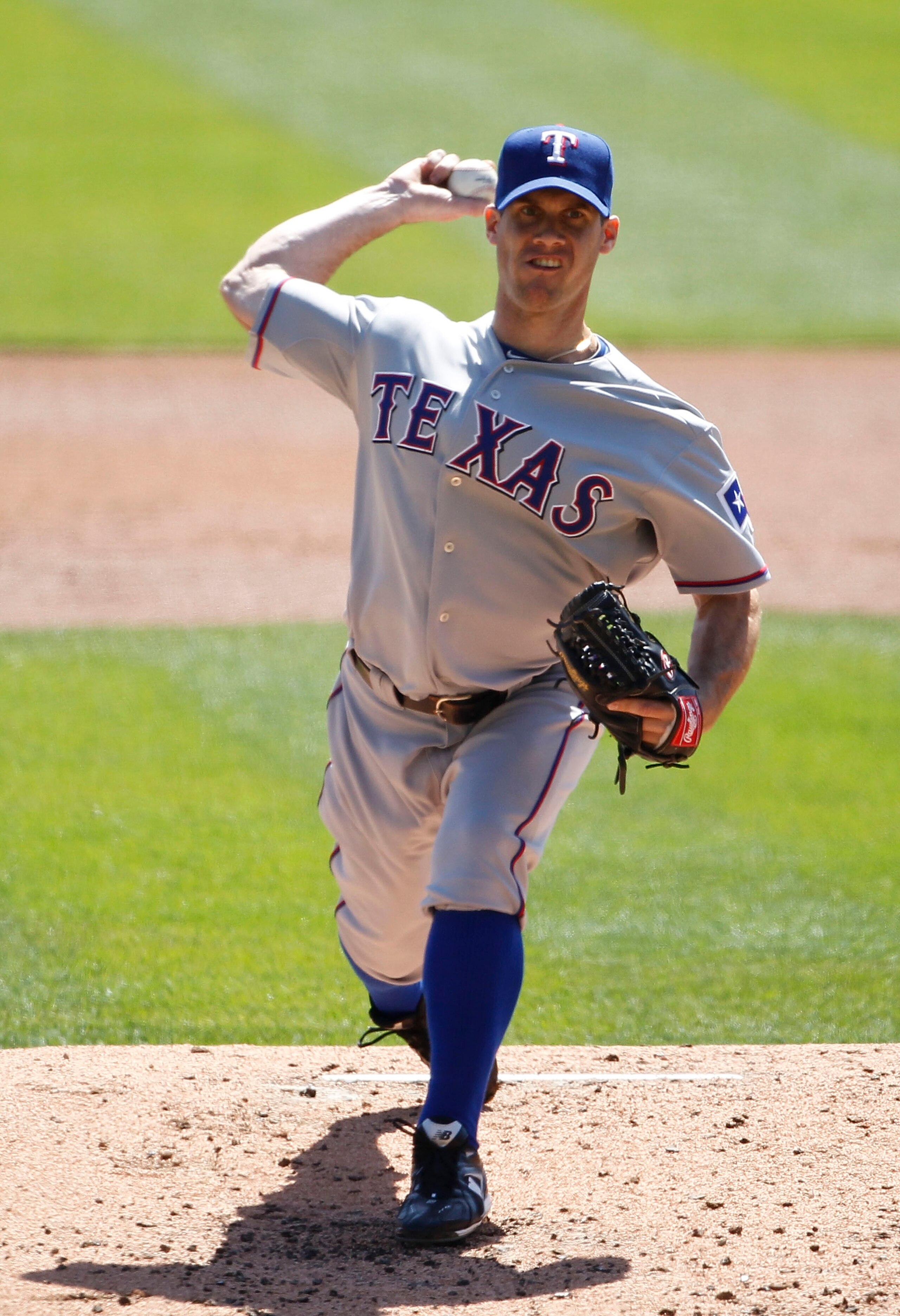 DETROIT - APRIL 13:  Dave Bush #47 of the Texas Rangers pitches in the first inning of the game against the Detroit Tigers at Comerica Park on April 13, 2011 in Detroit, Michigan. The Tigers defeated the Rangers 3-2.  (Photo by Leon Halip/Getty Images)