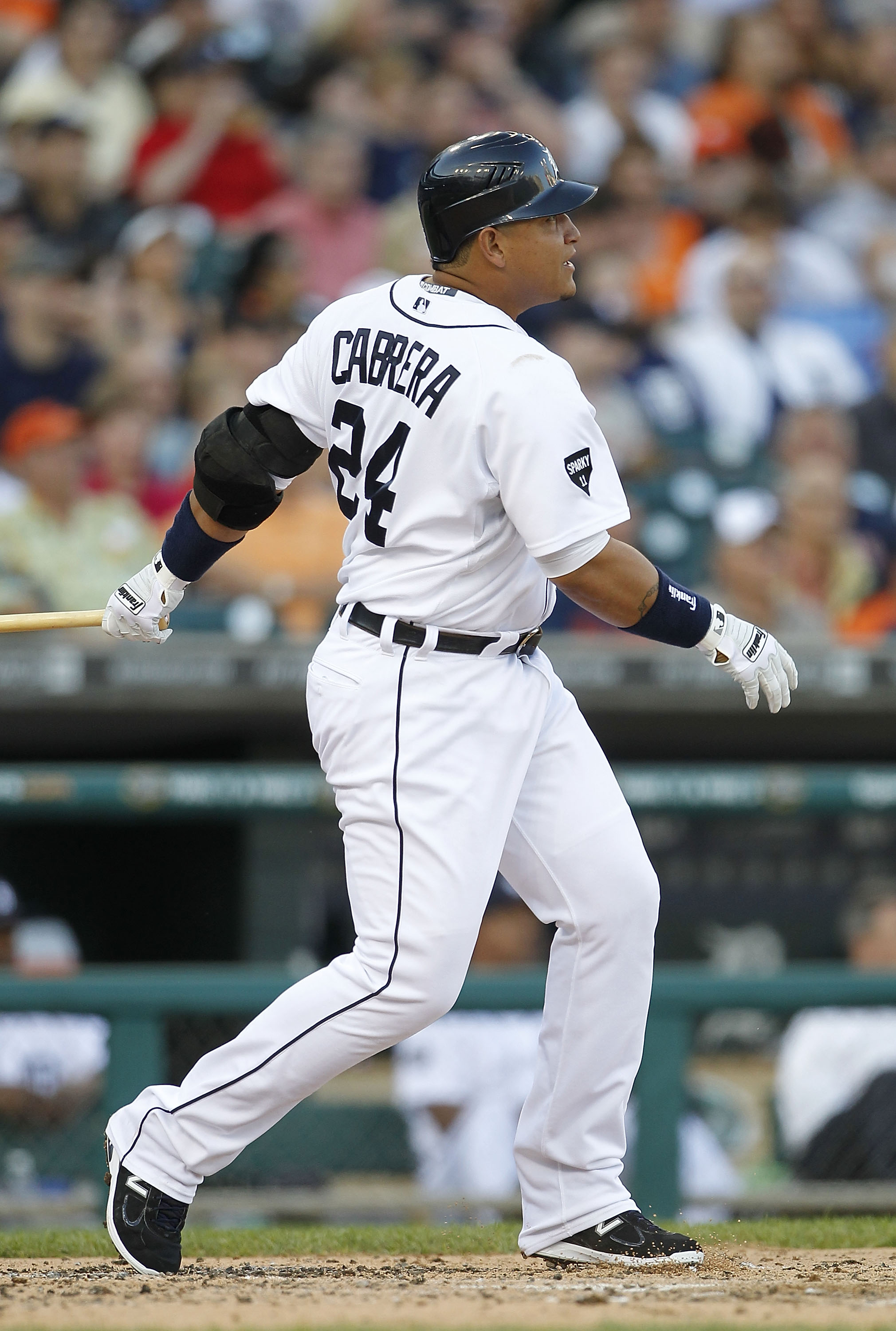 DETROIT - JUNE 01: Miguel Cabrera #24 of the Detroit Tigers hits a three run home run in the third inning scoring Brennan Boesch #26 and Ramon Santiago #39 during the game against the Minnesota Twins at Comerica Park on June 1, 2011 in Detroit, Michigan. DETROIT - JUNE 01: Miguel Cabrera #24 of the Detroit Tigers hits a three run home run in the third inning scoring Brennan Boesch #26 and Ramon Santiago #39 during the game against the Minnesota Twins at Comerica Park on June 1, 2011 in Detroit, Michigan.