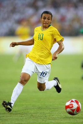 BEIJING - AUGUST 12: Marta of Brazil runs with the ball during the Women's First Round Group F match between Nigeria and Brazil at the Workers' Stadium on Day 4 of the Beijing 2008 Olympic Games on August 12, 2008 in Beijing, China. (Photo by Jeff Gross BEIJING - AUGUST 12: Marta of Brazil runs with the ball during the Women's First Round Group F match between Nigeria and Brazil at the Workers' Stadium on Day 4 of the Beijing 2008 Olympic Games on August 12, 2008 in Beijing, China. (Photo by Jeff Gross