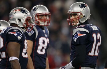 FOXBORO, MA - JANUARY 16:  Quarterback Tom Brady #12 of the New England Patriots stands on the field during their 2011 AFC divisional playoff game against the New York Jets at Gillette Stadium on January 16, 2011 in Foxboro, Massachusetts.  (Photo by Elsa