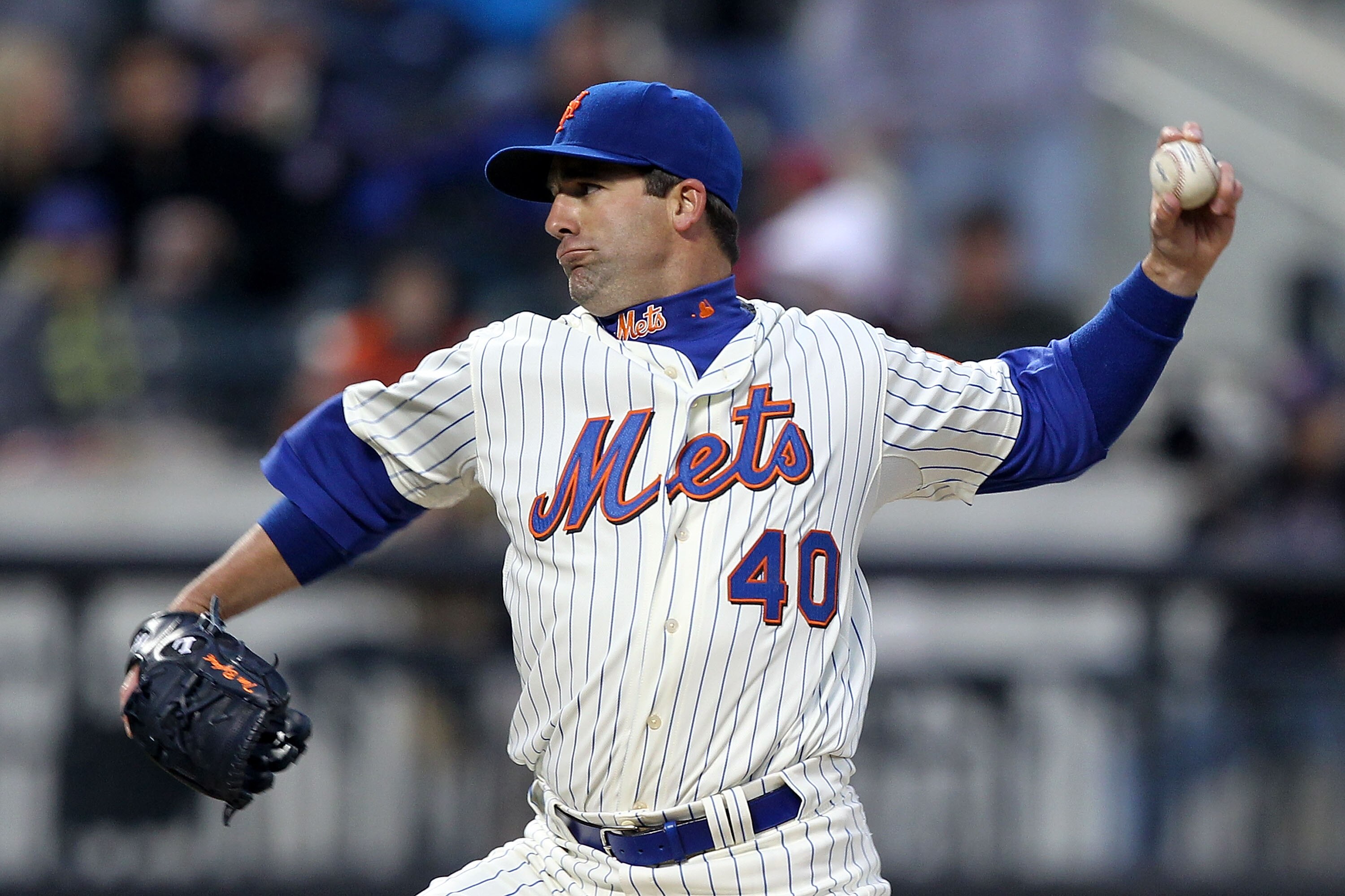 NEW YORK, NY - APRIL 08:  Tim Byrdak #40 of the New York Mets throws a pitch against the Washington Nationals during the Mets' Home Opener at Citi Field on April 8, 2011 in the Flushing neighborhood of Queens in New York City.  (Photo by Al Bello/Getty Im