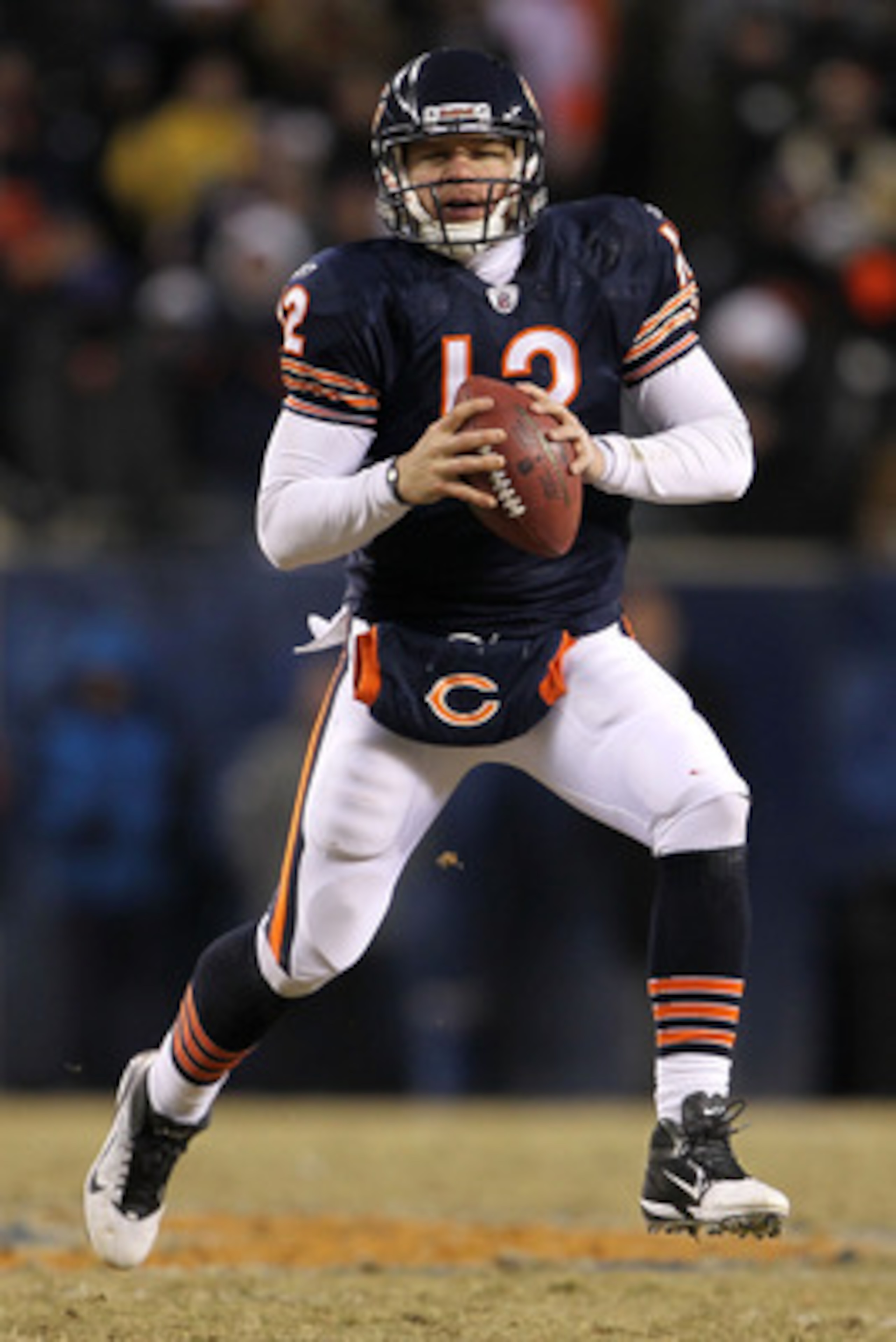CHICAGO, IL - JANUARY 23:  Caleb Hanie #12 of the Chicago Bears looks to pass against the Green Bay Packers in the second half in the NFC Championship Game at Soldier Field on January 23, 2011 in Chicago, Illinois.  (Photo by Jamie Squire/Getty Images)