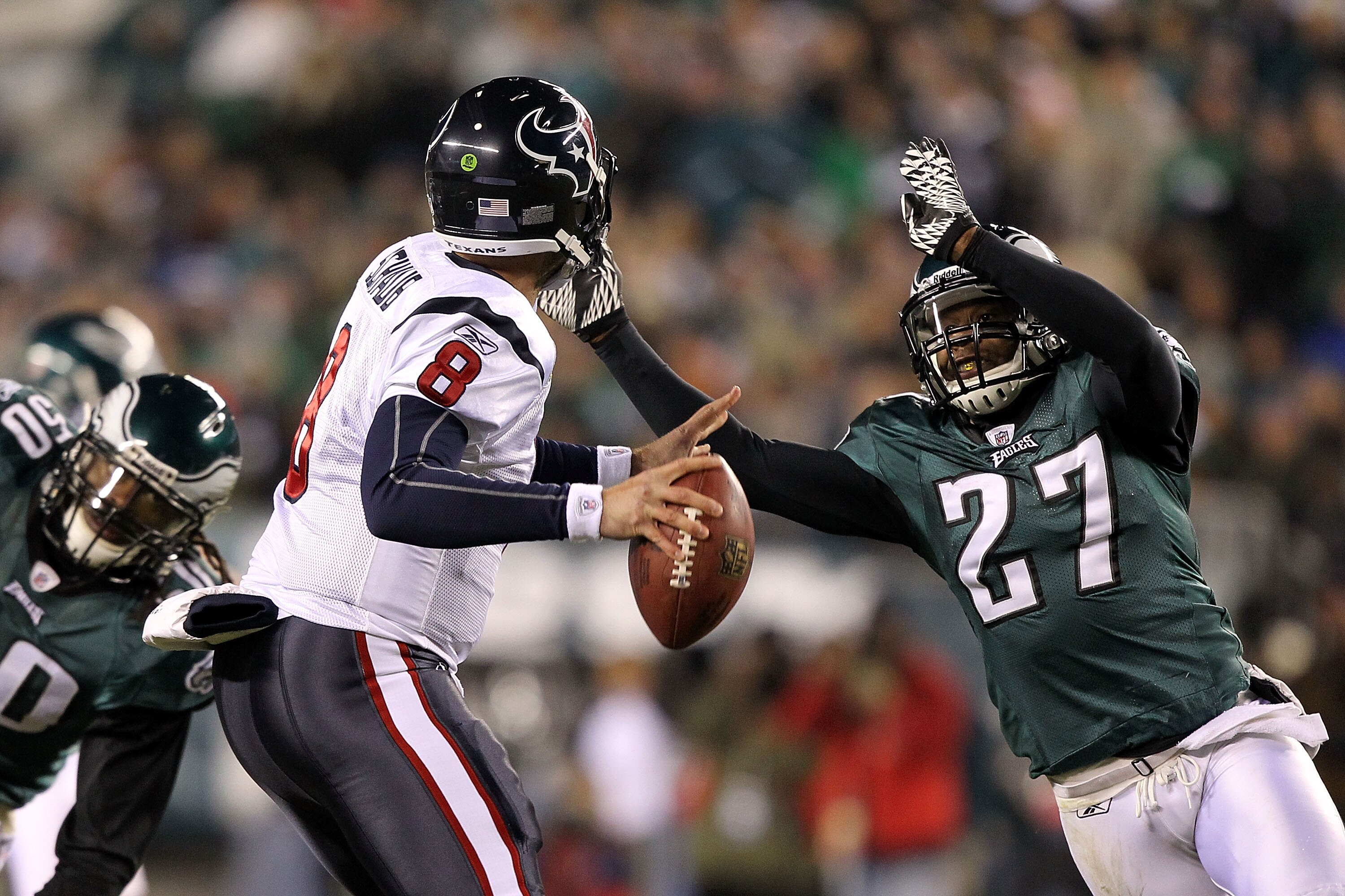 PHILADELPHIA, PA - DECEMBER 02:  Quintin Mikell #27 of the Philadelphia Eagles applies pressure on a blitz against quarterback Matt Schaub #8 of the Houston Texans at Lincoln Financial Field on December 2, 2010 in Philadelphia, Pennsylvania.  (Photo by Al