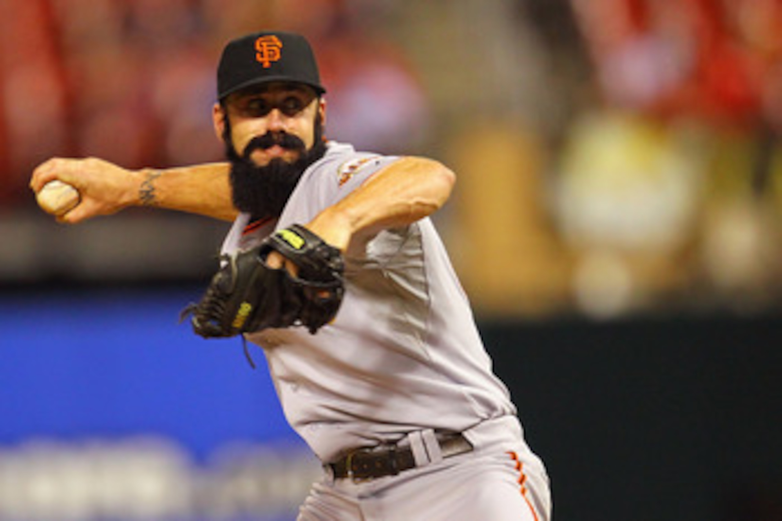 ST. LOUIS, MO - JUNE 1: Reliever Brian Wilson #38 of the San Francisco Giants pitches against the St. Louis Cardinals at Busch Stadium on June 1, 2011 in St. Louis, Missouri.  (Photo by Dilip Vishwanat/Getty Images)