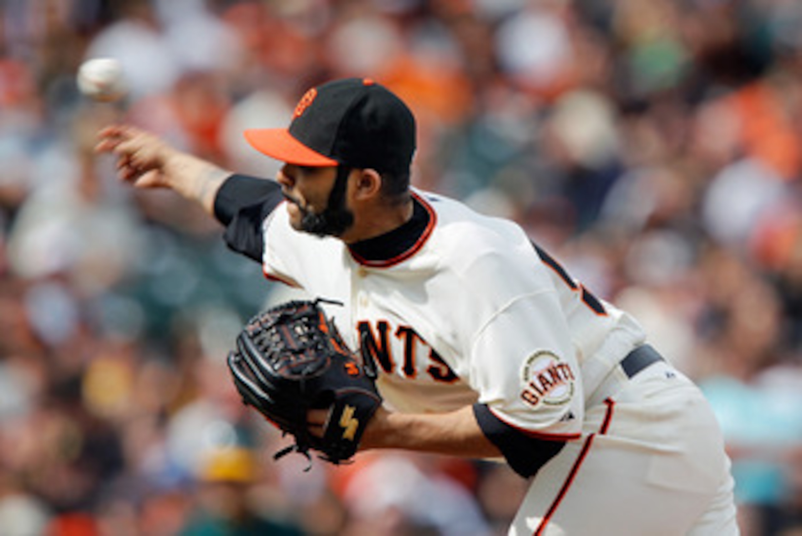 SAN FRANCISCO, CA - MAY 22: Sergio Romo of the San Francisco Giants pitches against the Oakland A's at AT&T Park on May 22, 2011 in San Francisco, California.  The Giants won 5-4.  (Photo by Brian Bahr/Getty Images)