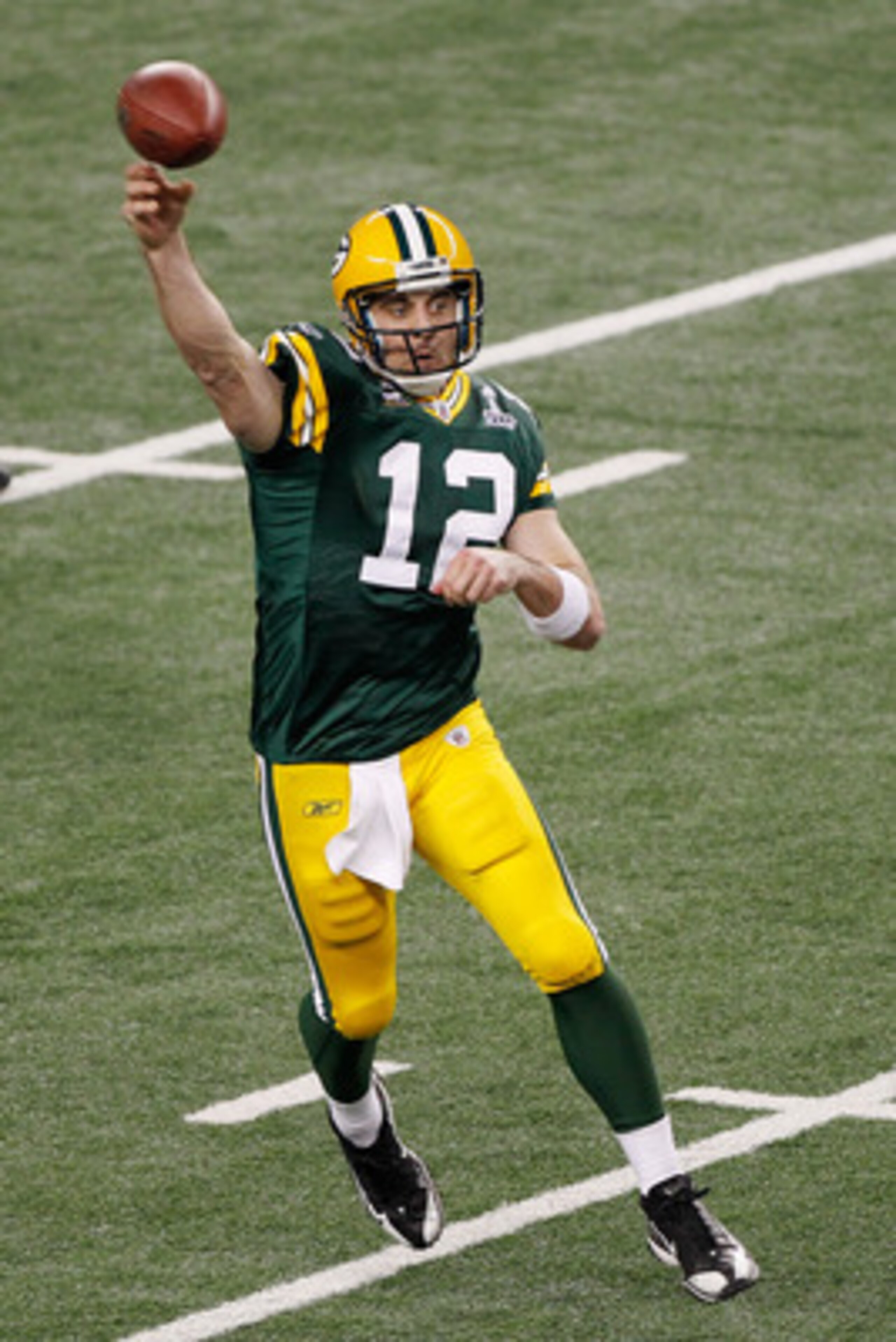 ARLINGTON, TX - FEBRUARY 06:  Aaron Rodgers #12 of the Green Bay Packers throws a pass against the Pittsburgh Steelers during Super Bowl XLV at Cowboys Stadium on February 6, 2011 in Arlington, Texas.  (Photo by Joe Robbins/Getty Images)
