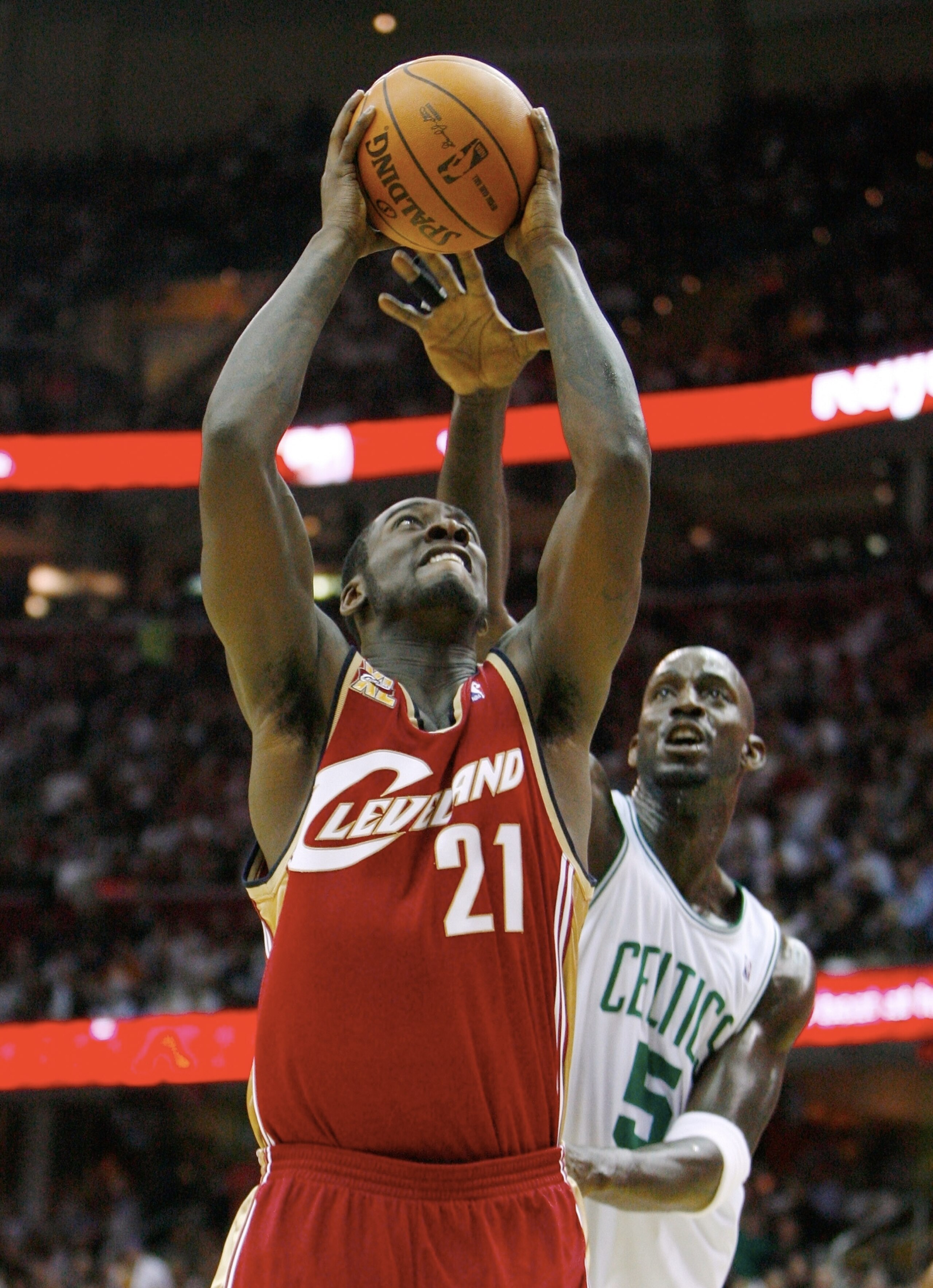 CLEVELAND - OCTOBER 27: J.J. Hickson #21 of the Cleveland Cavaliers puts up a shot against Kevin Garnett #5 of the Boston Celtics during the season opener at Quicken Loans Arena on October 27, 2009 in Cleveland, Ohio. NOTE TO USER: User expressly acknow CLEVELAND - OCTOBER 27: J.J. Hickson #21 of the Cleveland Cavaliers puts up a shot against Kevin Garnett #5 of the Boston Celtics during the season opener at Quicken Loans Arena on October 27, 2009 in Cleveland, Ohio. NOTE TO USER: User expressly acknow