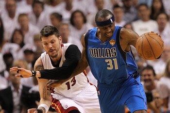 MIAMI, FL - JUNE 02:  Jason Terry #31 of the Dallas Mavericks puses the ball up court against Mike Miller #13 of the Miami Heat in Game Two of the 2011 NBA Finals at American Airlines Arena on June 2, 2011 in Miami, Florida. NOTE TO USER: User expressly a