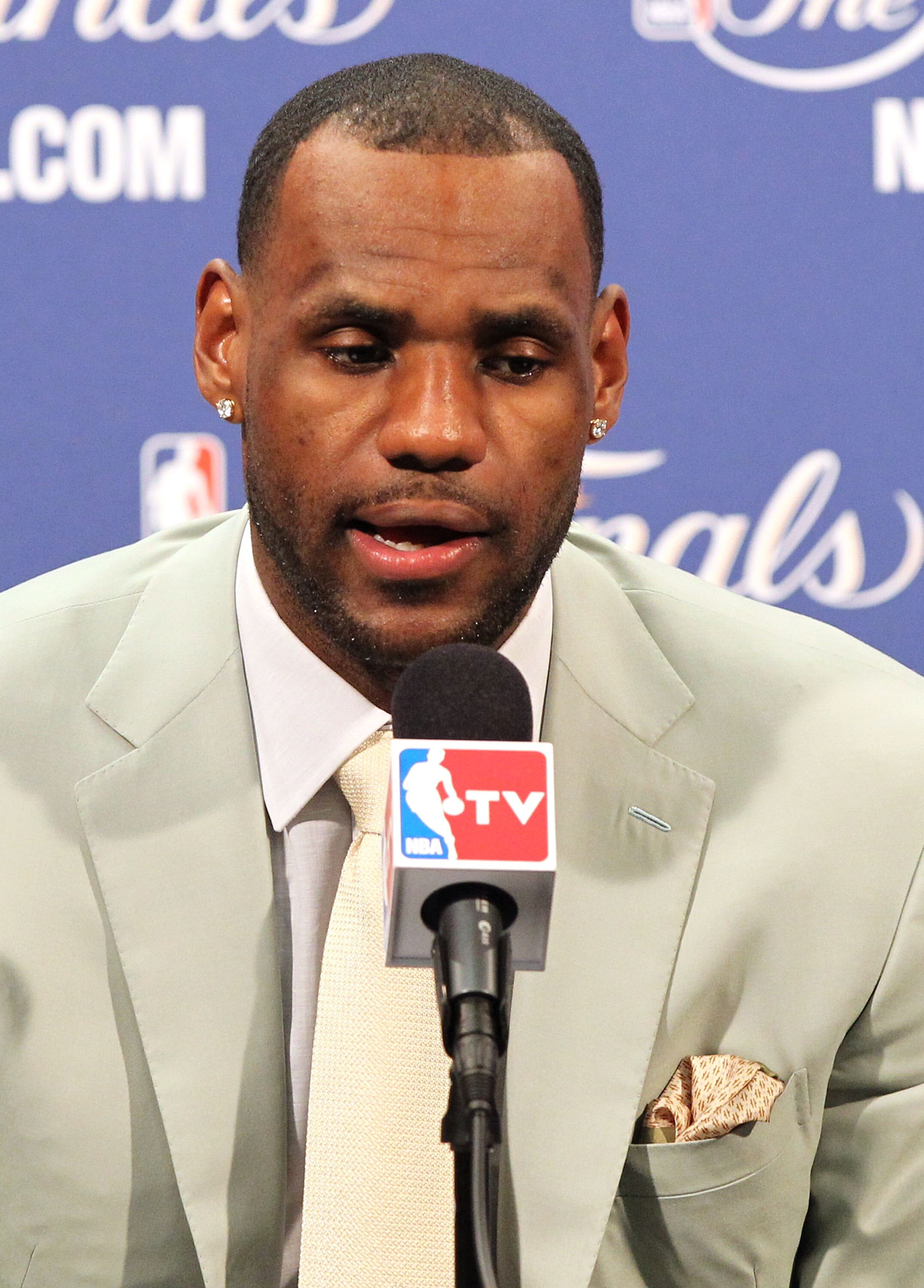 MIAMI, FL - JUNE 02:  LeBron James #6 of the Miami Heat answers questions from the media at a post game press conference after the Heat lost 95-93 against the Dallas Mavericks in Game Two of the 2011 NBA Finals at American Airlines Arena on June 2, 2011 i