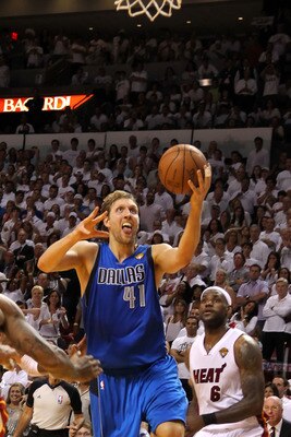 MIAMI, FL - JUNE 02:  Dirk Nowitzki #41 of the Dallas Mavericks makes the game-winning shot to put the Mavericks up 95-93 with 3.6 seconds left in the game against Udonis Haslem #40 of the Miami Heat in Game Two of the 2011 NBA Finals at American Airlines