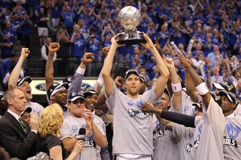 DALLAS, TX - MAY 25: Dirk Nowitzki #41 and the Dallas Mavericks celebrate their 100-96 victory against the Oklahoma City Thunder in Game Five of the Western Conference Finals during the 2011 NBA Playoffs at American Airlines Center on May 25, 2011 in Dal DALLAS, TX - MAY 25: Dirk Nowitzki #41 and the Dallas Mavericks celebrate their 100-96 victory against the Oklahoma City Thunder in Game Five of the Western Conference Finals during the 2011 NBA Playoffs at American Airlines Center on May 25, 2011 in Dal