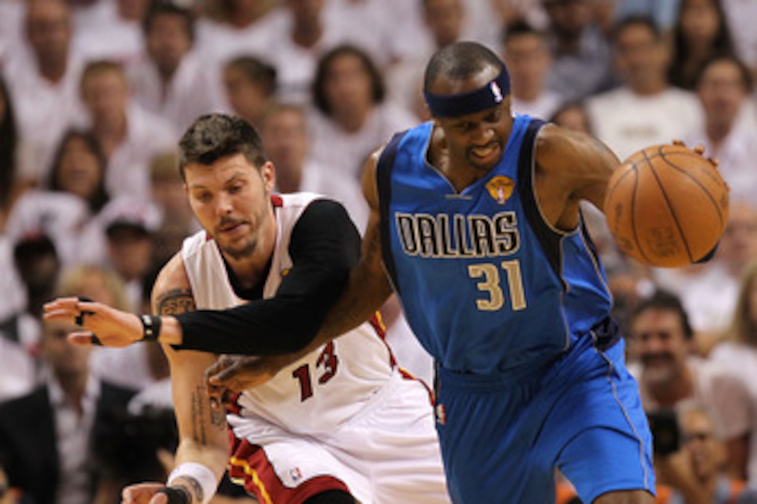 MIAMI, FL - JUNE 02:  Jason Terry #31 of the Dallas Mavericks puses the ball up court against Mike Miller #13 of the Miami Heat in Game Two of the 2011 NBA Finals at American Airlines Arena on June 2, 2011 in Miami, Florida. NOTE TO USER: User expressly a
