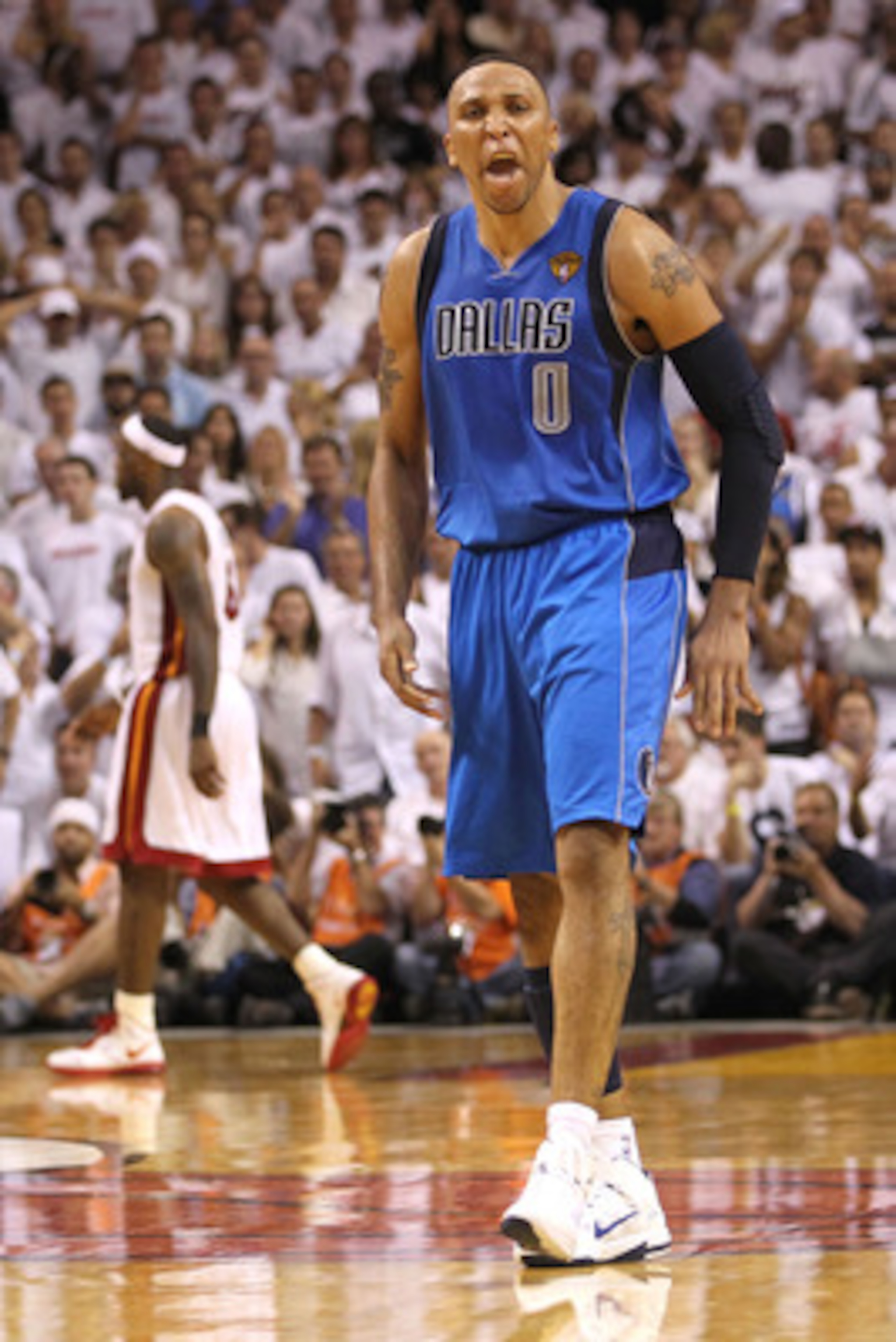 MIAMI, FL - JUNE 02:  Shawn Marion #0 of the Dallas Mavericks reacts against LeBron James #6 of the Miami Heat in Game Two of the 2011 NBA Finals at American Airlines Arena on June 2, 2011 in Miami, Florida. NOTE TO USER: User expressly acknowledges and a