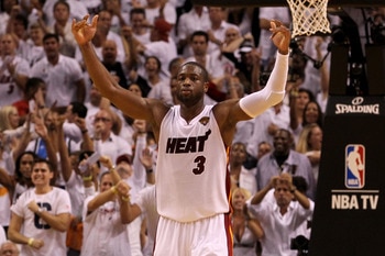 MIAMI, FL - JUNE 02:  Dwyane Wade #3 of the Miami Heat celebrates after he made a 3-point shot in the final minute of the fourth quarter to tie the game 93-93 against the Dallas Mavericks in Game Two of the 2011 NBA Finals at American Airlines Arena on Ju