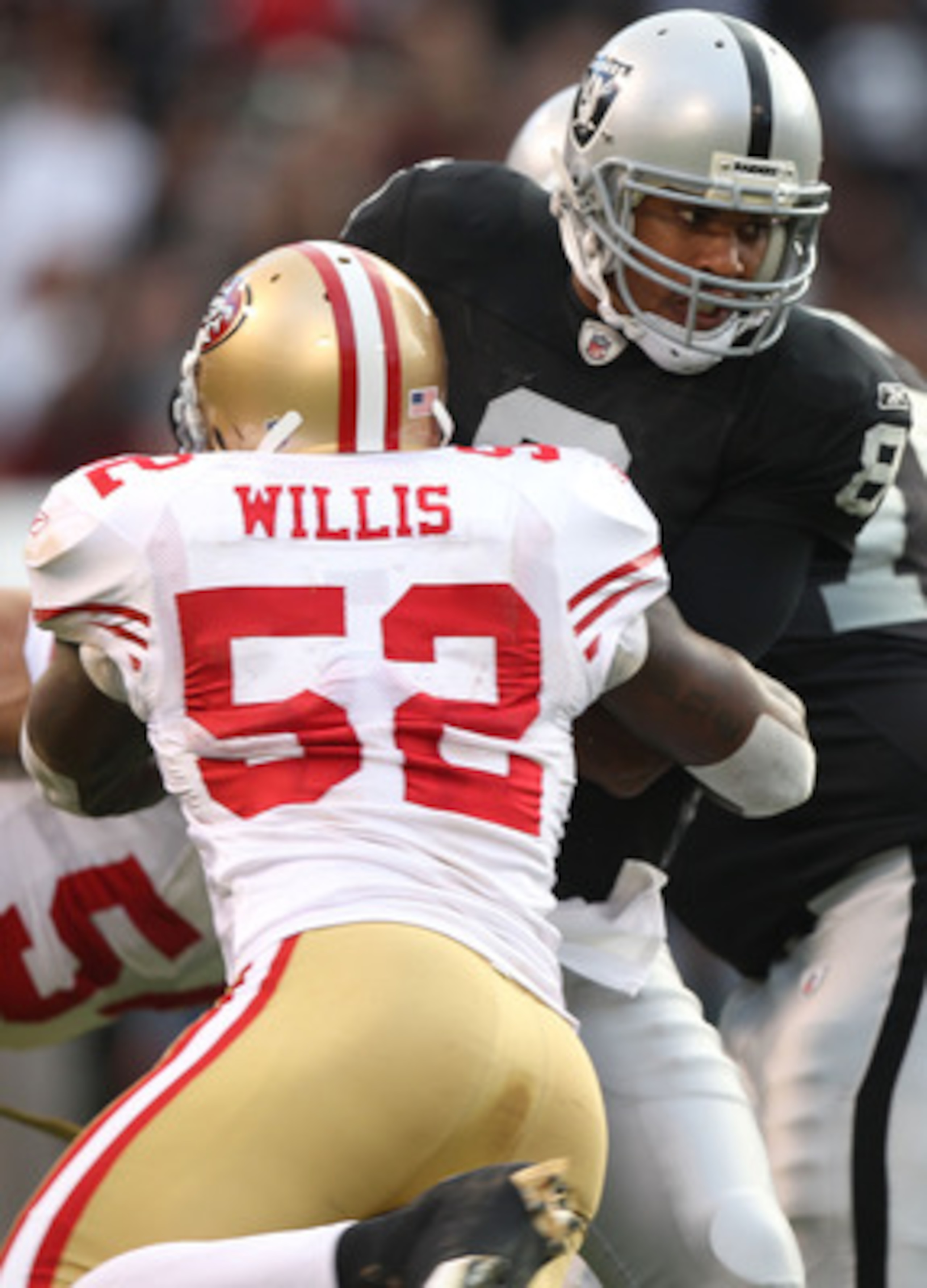 OAKLAND, CA - AUGUST 28:  Patrick Willis #52 of the San Francisco 49ers sacks Jason Campbell #8 of the Oakland Raiders during an NFL preseason game at Oakland-Alameda County Coliseum on August 28, 2010 in Oakland, California.  (Photo by Jed Jacobsohn/Gett