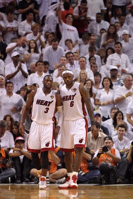 MIAMI, FL - JUNE 02:  (L-R) Dwyane Wade #3 and LeBron James #6 of the Miami Heat stand on the court against the Dallas Mavericks in Game Two of the 2011 NBA Finals at American Airlines Arena on June 2, 2011 in Miami, Florida. NOTE TO USER: User expressly