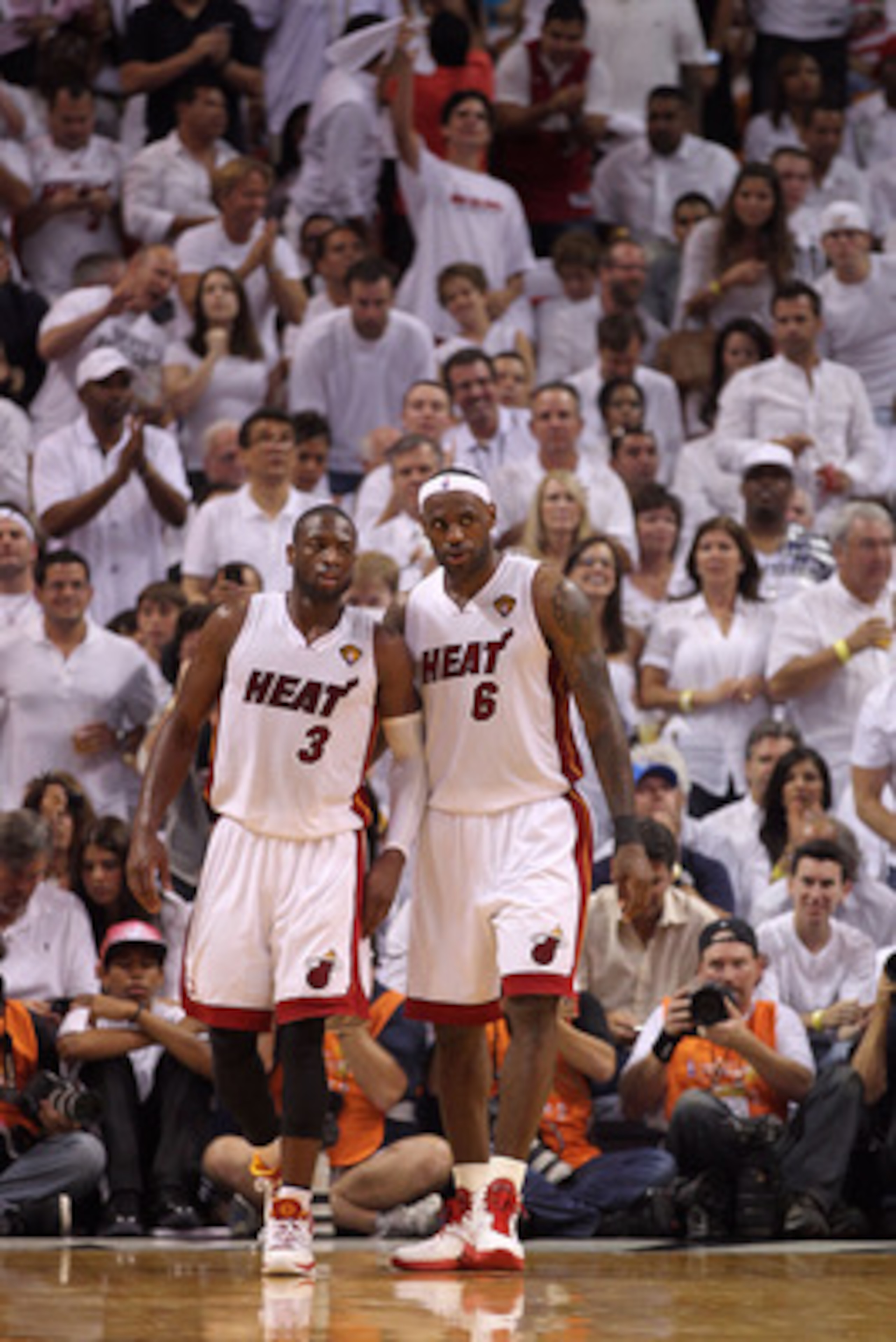 MIAMI, FL - JUNE 02:  (L-R) Dwyane Wade #3 and LeBron James #6 of the Miami Heat stand on the court against the Dallas Mavericks in Game Two of the 2011 NBA Finals at American Airlines Arena on June 2, 2011 in Miami, Florida. NOTE TO USER: User expressly