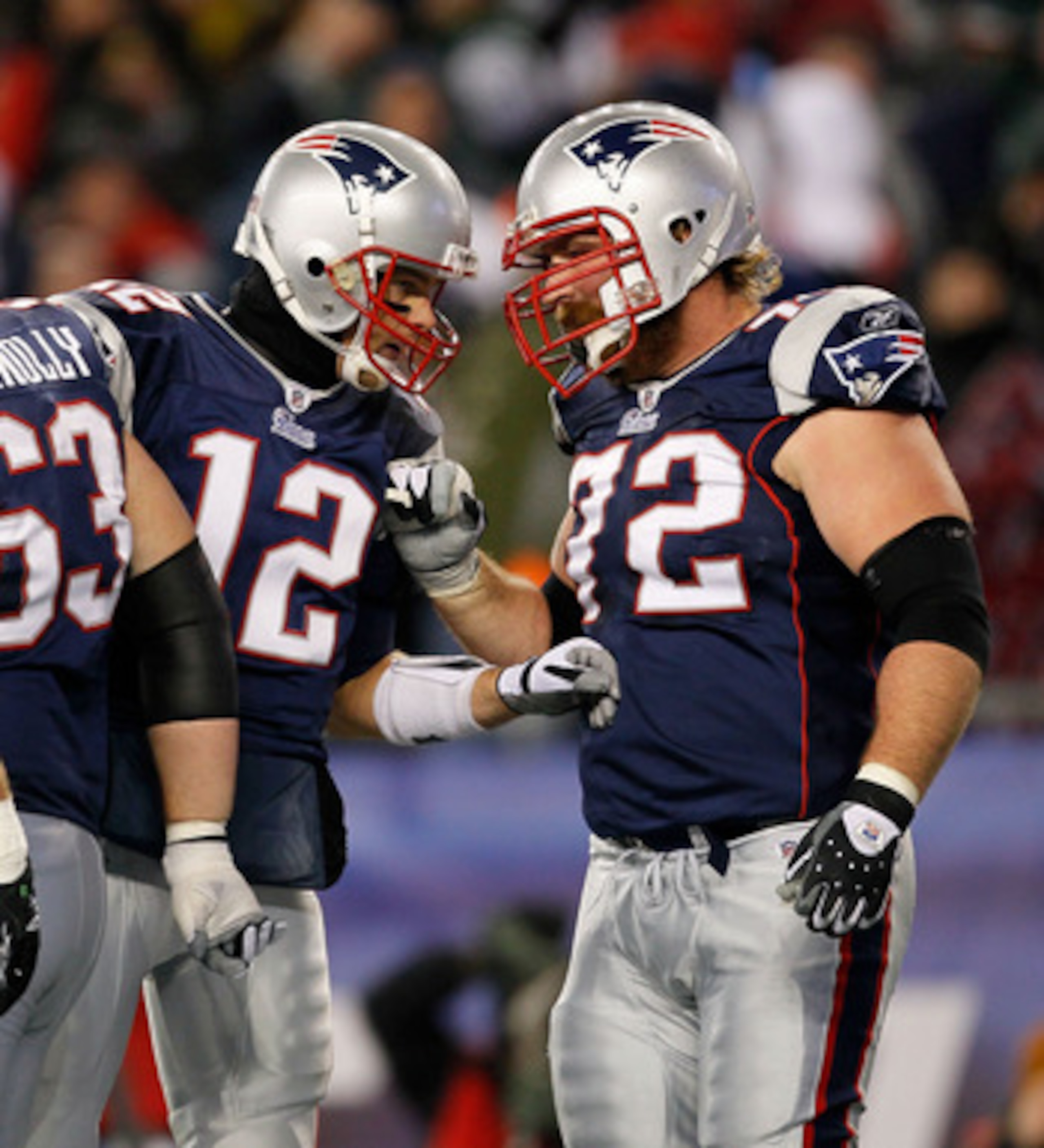 FOXBORO, MA - DECEMBER 06:  Tom Brady #12 and Matt Light #72 of the New England Patriots talk as they break the huddle against the New York Jets at Gillette Stadium on December 6, 2010 in Foxboro, Massachusetts. The Patriots won 45-3. (Photo by Jim Rogash
