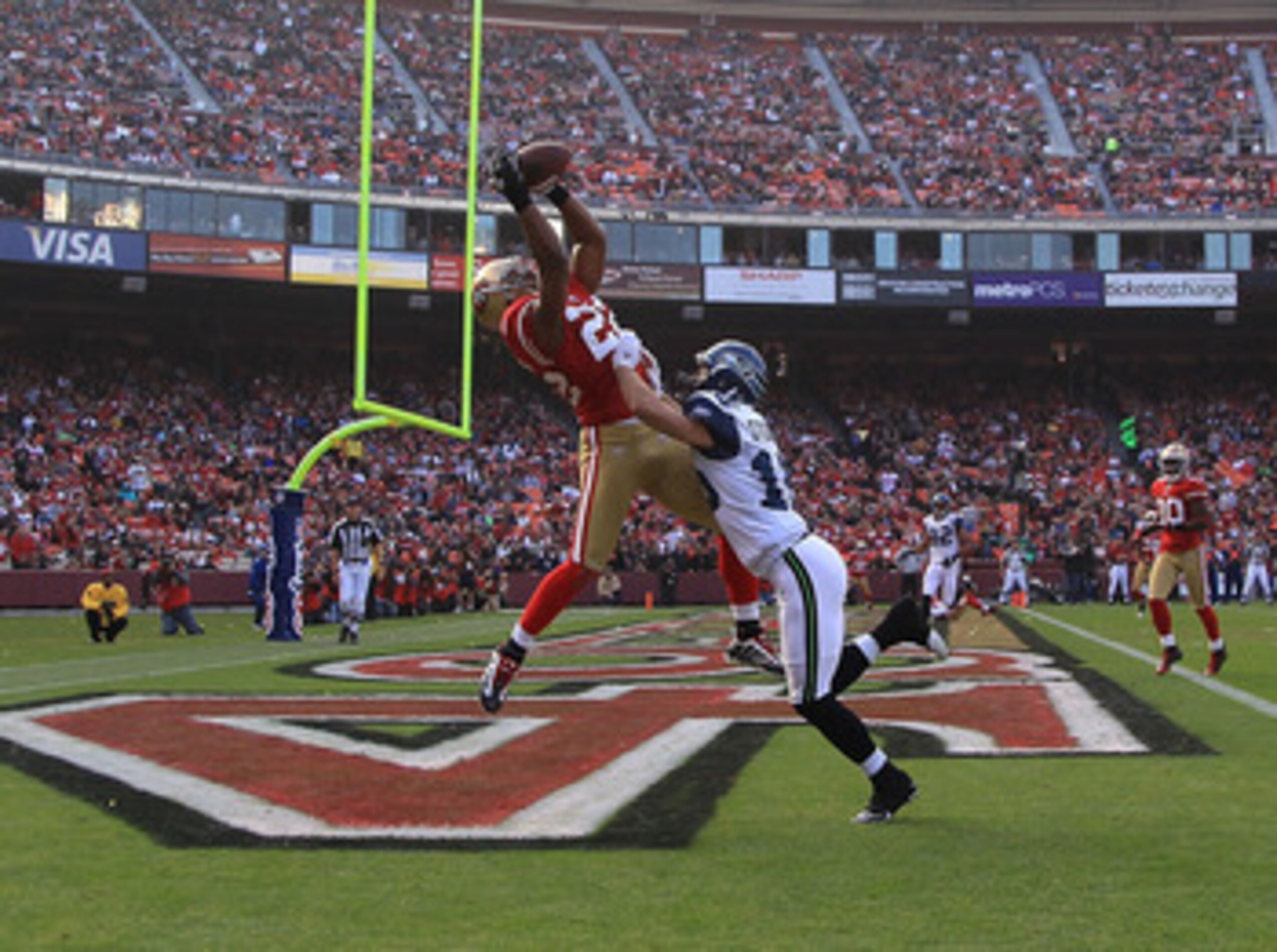 SAN FRANCISCO - DECEMBER 12:    Nate Clements #22 of the San Francisco 49ers intercepts a ball in the endzone against the Seattle Seahawks during an NFL game at Candlestick Park on December 12, 2010 in San Francisco, California.  (Photo by Jed Jacobsohn/G