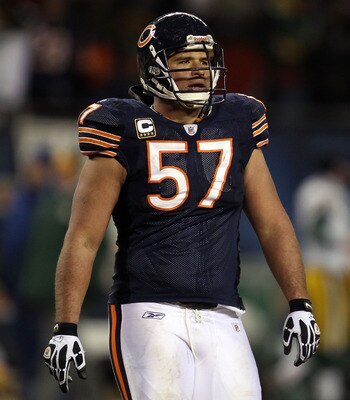 CHICAGO, IL - JANUARY 23:  Olin Kreutz #57 of the Chicago Bears looks on late in the fourth quarter against the Green Bay Packers in the NFC Championship Game at Soldier Field on January 23, 2011 in Chicago, Illinois.  (Photo by Jonathan Daniel/Getty Imag