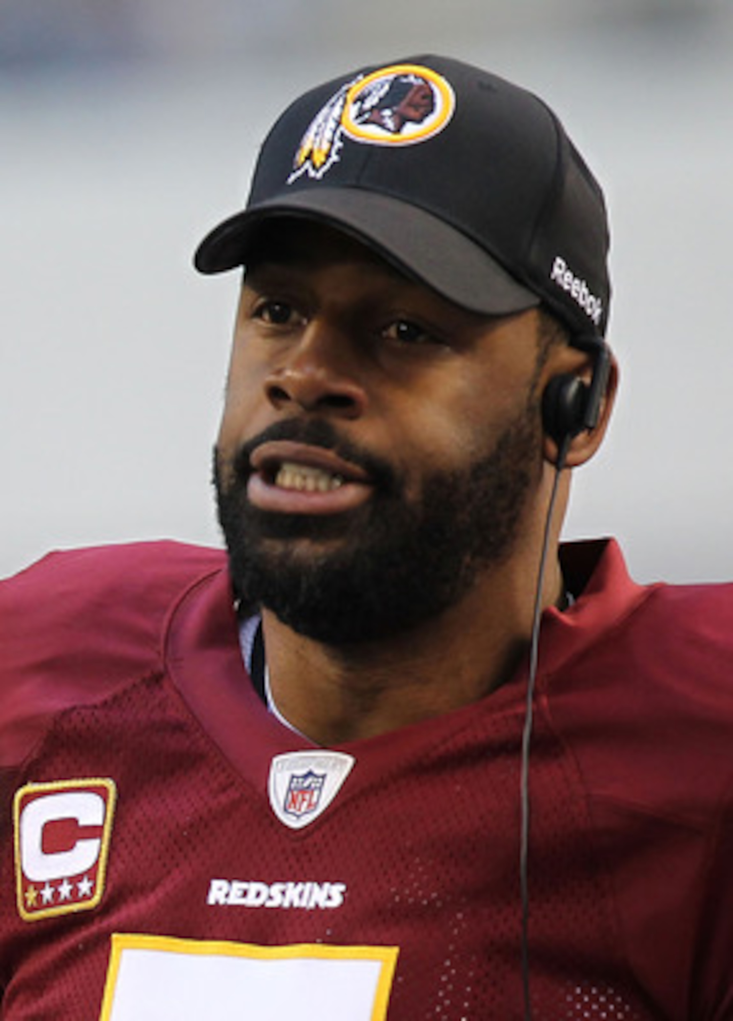 ARLINGTON, TX - DECEMBER 19:  Quarterback Donovan McNabb #5  of the Washington Redskins on the sidelines against play against the Dallas Cowboys at Cowboys Stadium on December 19, 2010 in Arlington, Texas.  (Photo by Ronald Martinez/Getty Images)