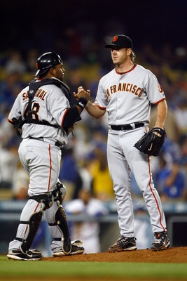 LOS ANGELES, CA - MAY 08:  Pitcher Brian Wilson (L) #38 of the San Francisco Giants is congratulated by catcher Pablo Sandoval #48 after saving the game against the Los Angeles Dodgers at Dodger Stadium on May 8, 2009 in Los Angeles, California. The Giant