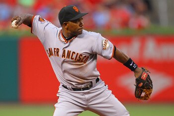 ST. LOUIS, MO - JUNE 2: Miguel Tejada #10 of the San Francisco Giants throws to first base against the St. Louis Cardinals at Busch Stadium on June 2, 2011 in St. Louis, Missouri.  (Photo by Dilip Vishwanat/Getty Images)