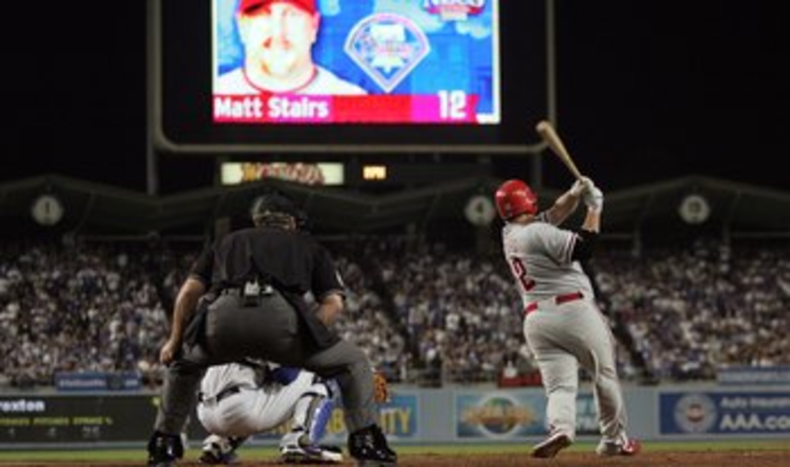 LOS ANGELES, CA - OCTOBER 13: Matt Stairs #12 of the Philadelphia Phillies hits a two-run pinch hit home run in the eighth inning off Jonathan Broxton #51 of the Los Angeles Dodgers to take a two-run lead in game Game Four of the National League Champion LOS ANGELES, CA - OCTOBER 13: Matt Stairs #12 of the Philadelphia Phillies hits a two-run pinch hit home run in the eighth inning off Jonathan Broxton #51 of the Los Angeles Dodgers to take a two-run lead in game Game Four of the National League Champion
