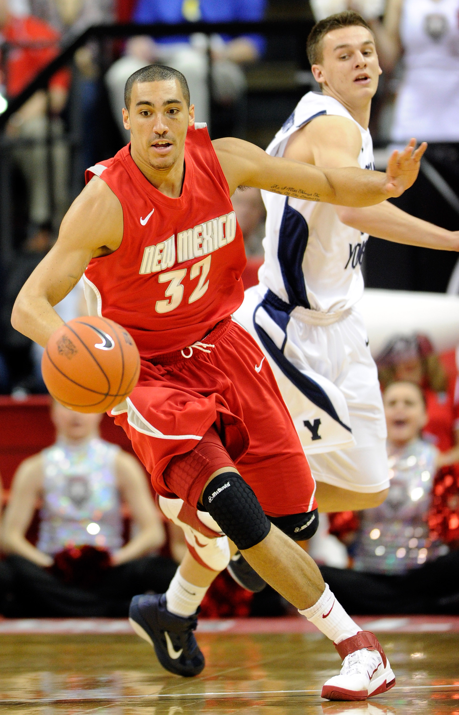 LAS VEGAS, NV - MARCH 11:  Drew Gordon #32 of the New Mexico Lobos goes after a loose ball in front of Kyle Collinsworth #31 of the Brigham Young University Cougars during a semifinal game of the Conoco Mountain West Conference Basketball tournament at th