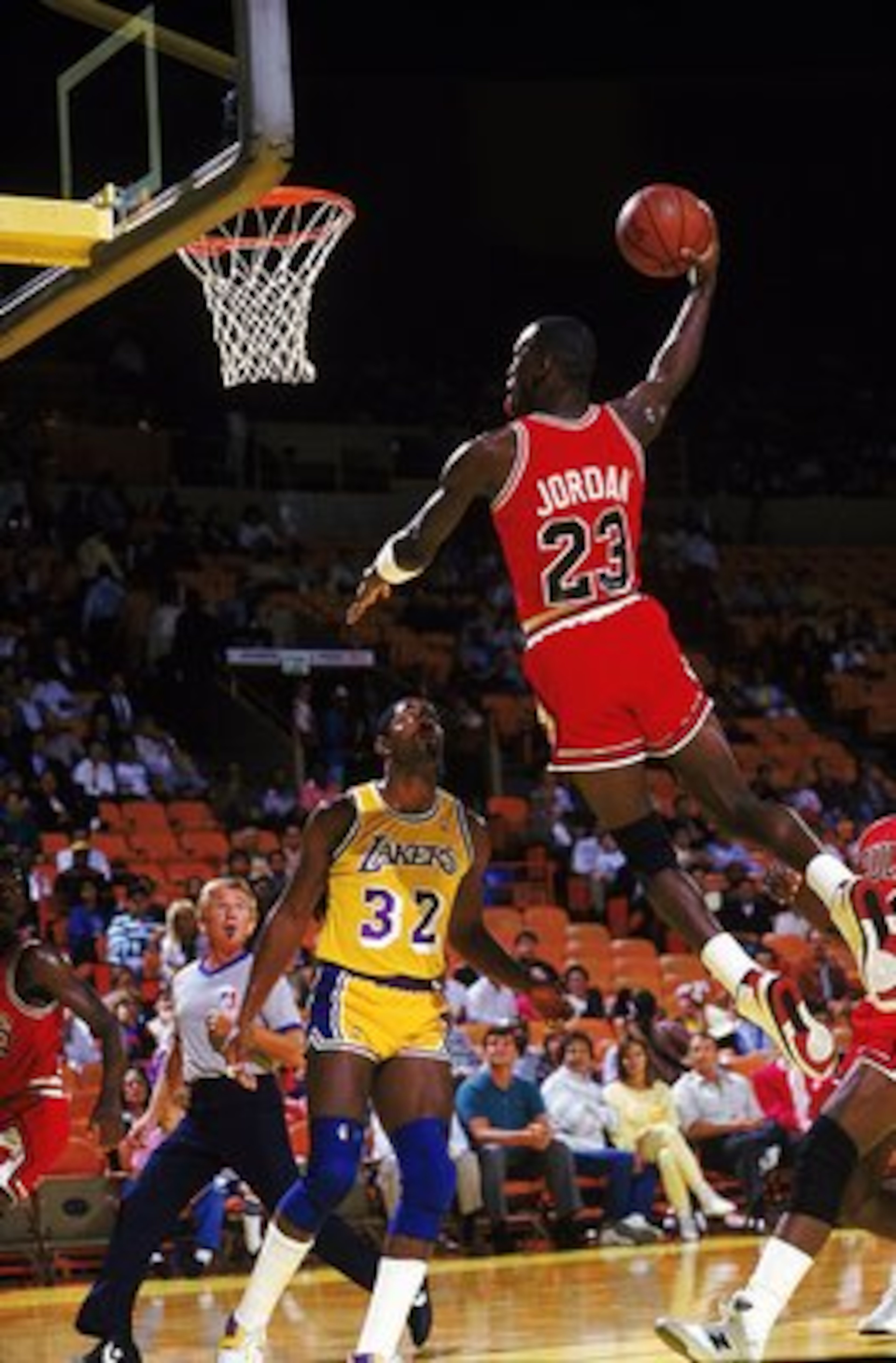 Michael Jordan #23 of the Chicago Bulls dunks the ball during a game against the Los Angeles Lakers. Michael Jordan #23 of the Chicago Bulls dunks the ball during a game against the Los Angeles Lakers.