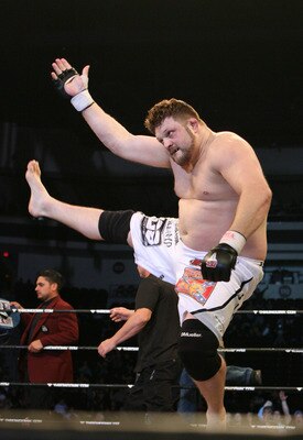LAS VEGAS - FEBRUARY 29:  Roy Nelson white trunks of Lion's Den celebrates his victory over Fabiano Scherner red trunks of Team Quest during their Heavyweight title bout at The Orleans Arena on February 29, 2008 in Las Vegas, Nevada.  (Photo by Ethan Mill