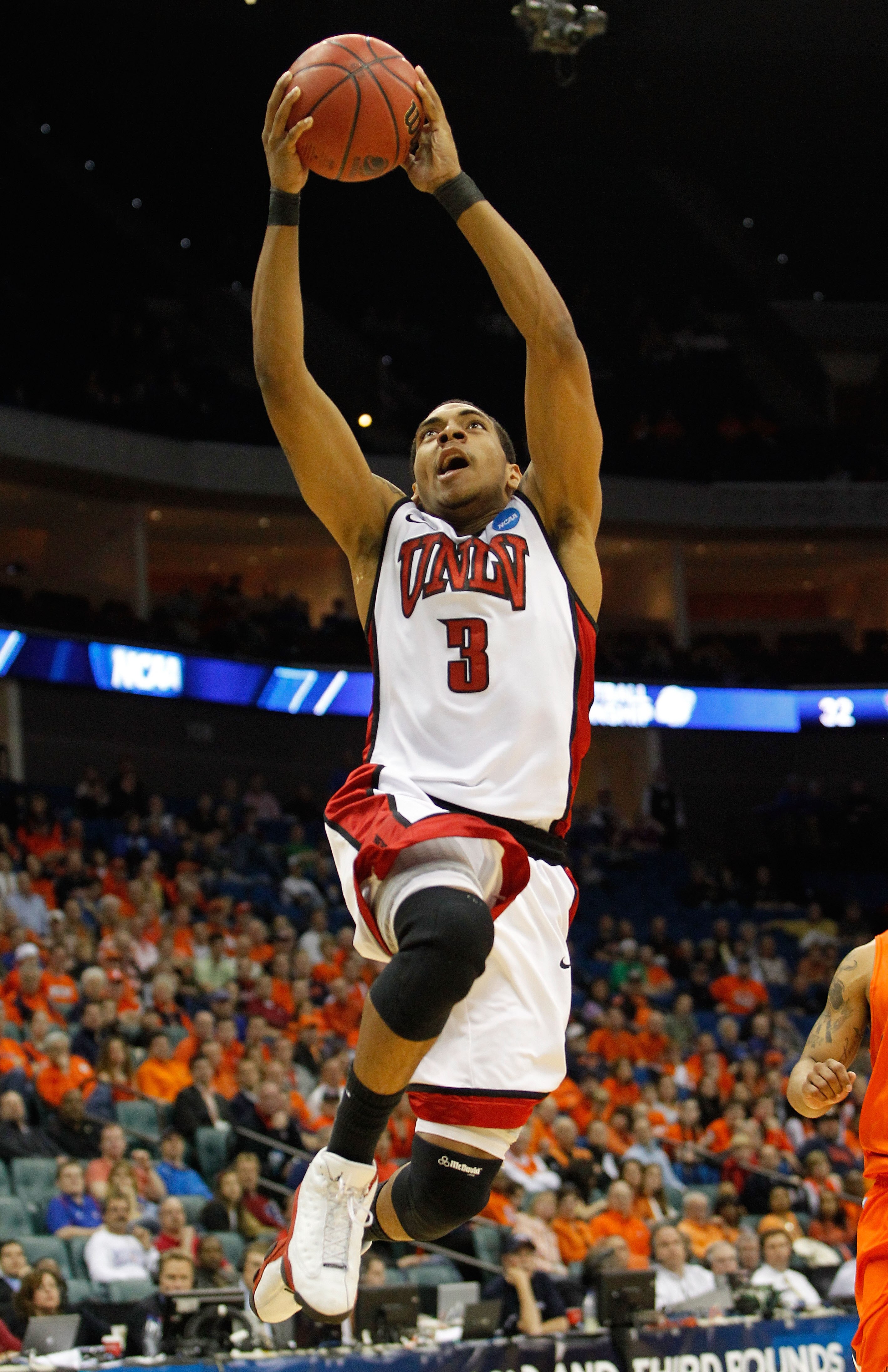 TULSA, OK - MARCH 18:  Anthony Marshall #3 of the UNLV Rebels goes up for a shot against the Illinois Fighting Illini during the second round of the 2011 NCAA men's basketball tournament at BOK Center on March 18, 2011 in Tulsa, Oklahoma.  (Photo by Tom P