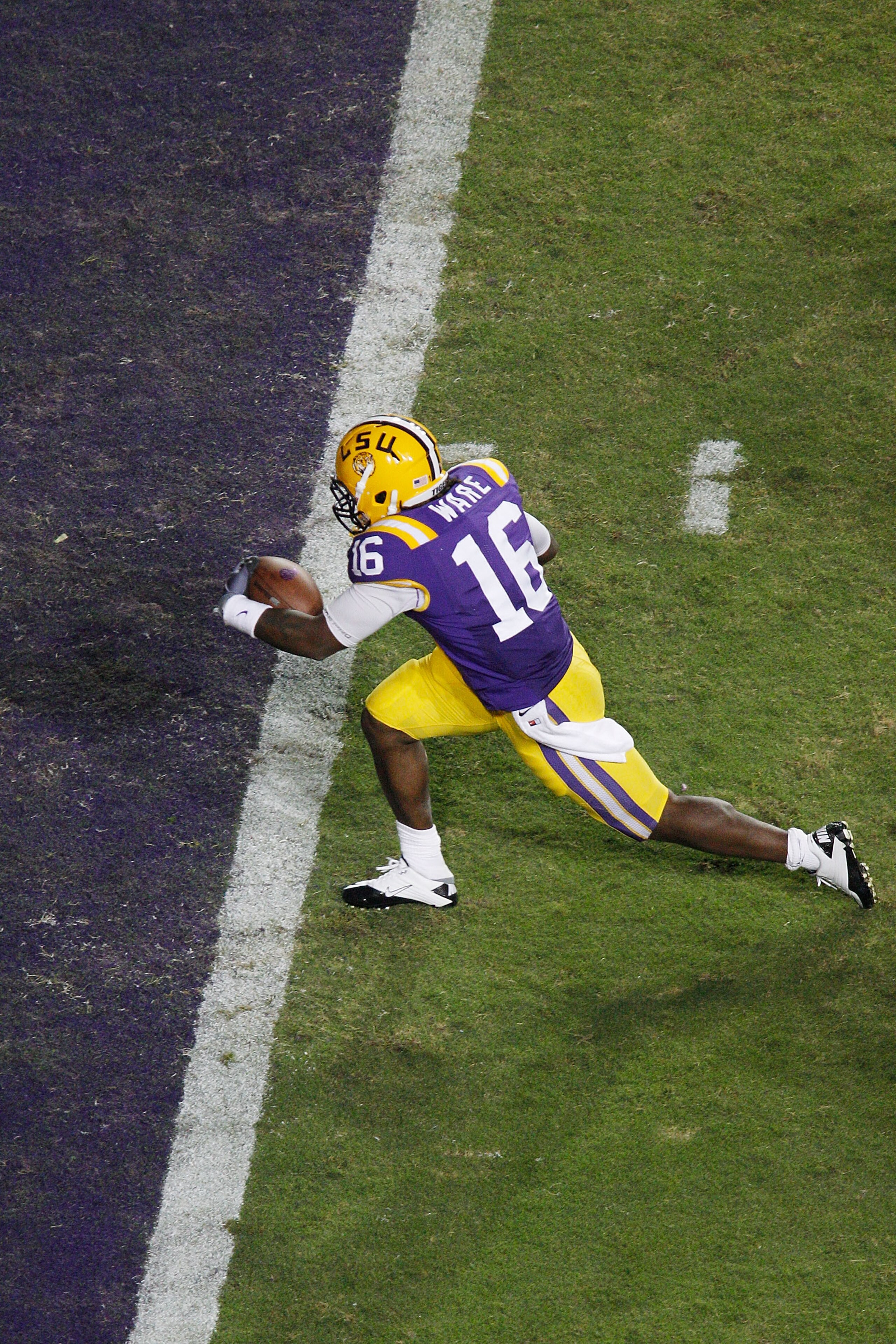 BATON ROUGE, LA - NOVEMBER 13:  Spencer Ware #16 of the Louisiana State University Tigers scores a touchdown during the game against the University of Louisiana-Monroe Warhawks at Tiger Stadium on November 13, 2010 in Baton Rouge, Louisiana. The Tigers de