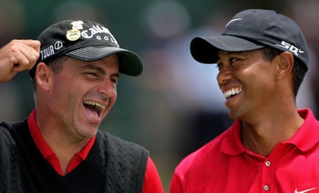 SAN DIEGO - JUNE 16:  Tiger Woods (R), champion, and Rocco Mediate (L), runner up, share a moment on the 18th green during the trophy presentation after the playoff round of the 108th U.S. Open at the Torrey Pines Golf Course (South Course) on June 16, 20