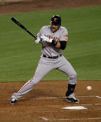 LOS ANGELES, CA - MAY 18:  Mark DeRosa #7 of the San Francisco Giants reacxts after being hit by his own foul ball in the fourth inning against the Los Angeles Dodgers on May 18, 2011 at Dodger Stadium in Los Angeles, California. DeRosa had to leave the g