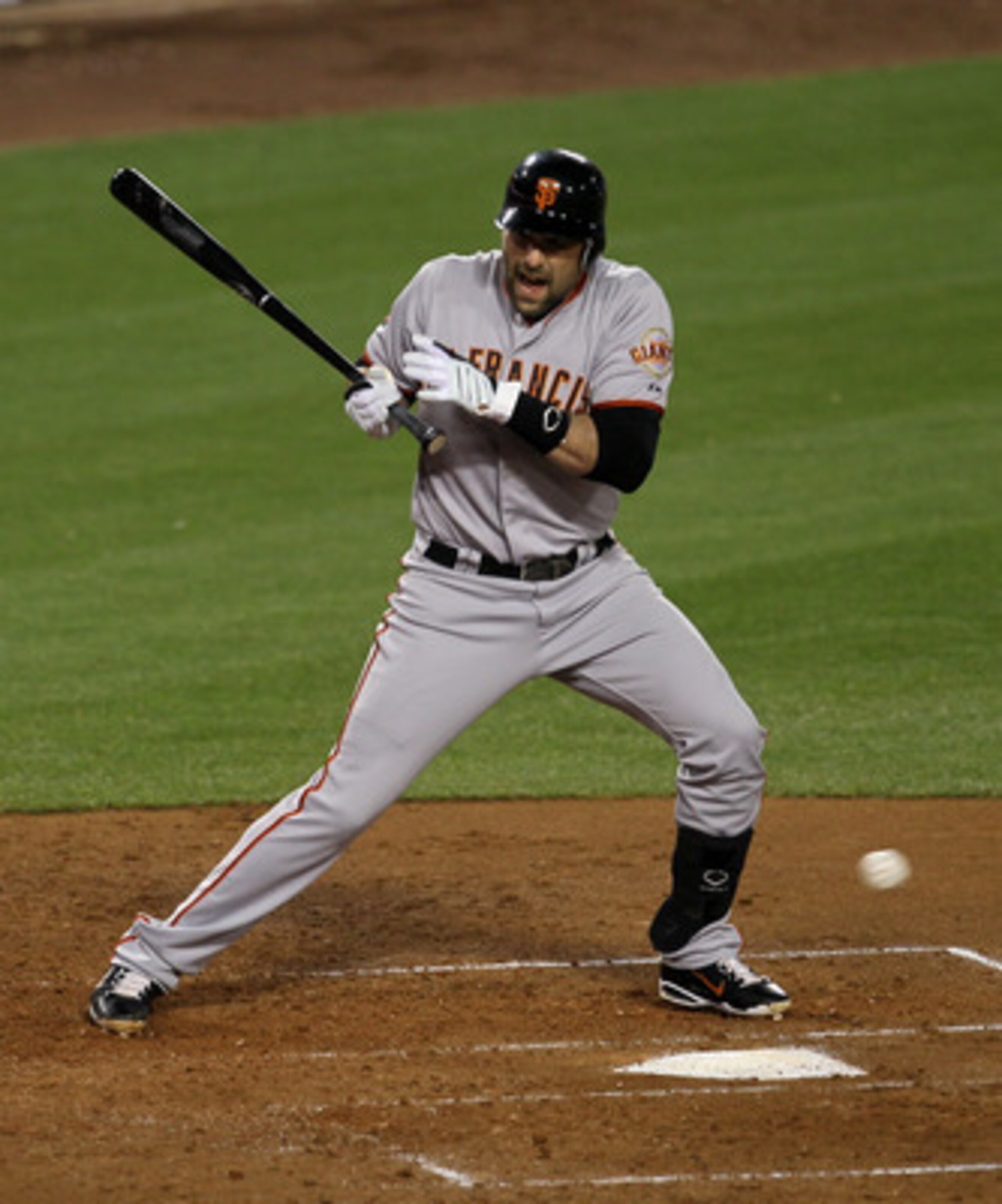 LOS ANGELES, CA - MAY 18:  Mark DeRosa #7 of the San Francisco Giants reacxts after being hit by his own foul ball in the fourth inning against the Los Angeles Dodgers on May 18, 2011 at Dodger Stadium in Los Angeles, California. DeRosa had to leave the g