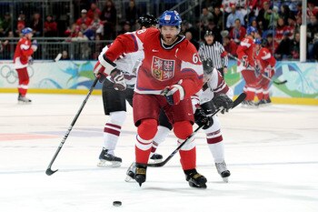 VANCOUVER, BC - FEBRUARY 23:  Jaromir Jagr #68 of Czech Republic skates with the puck during the ice hockey Men's Play-off qualification match between the Czech Republic and Latvia on day 12 of the Vancouver 2010 Winter Olympics at UBC Thunderbird Arena o