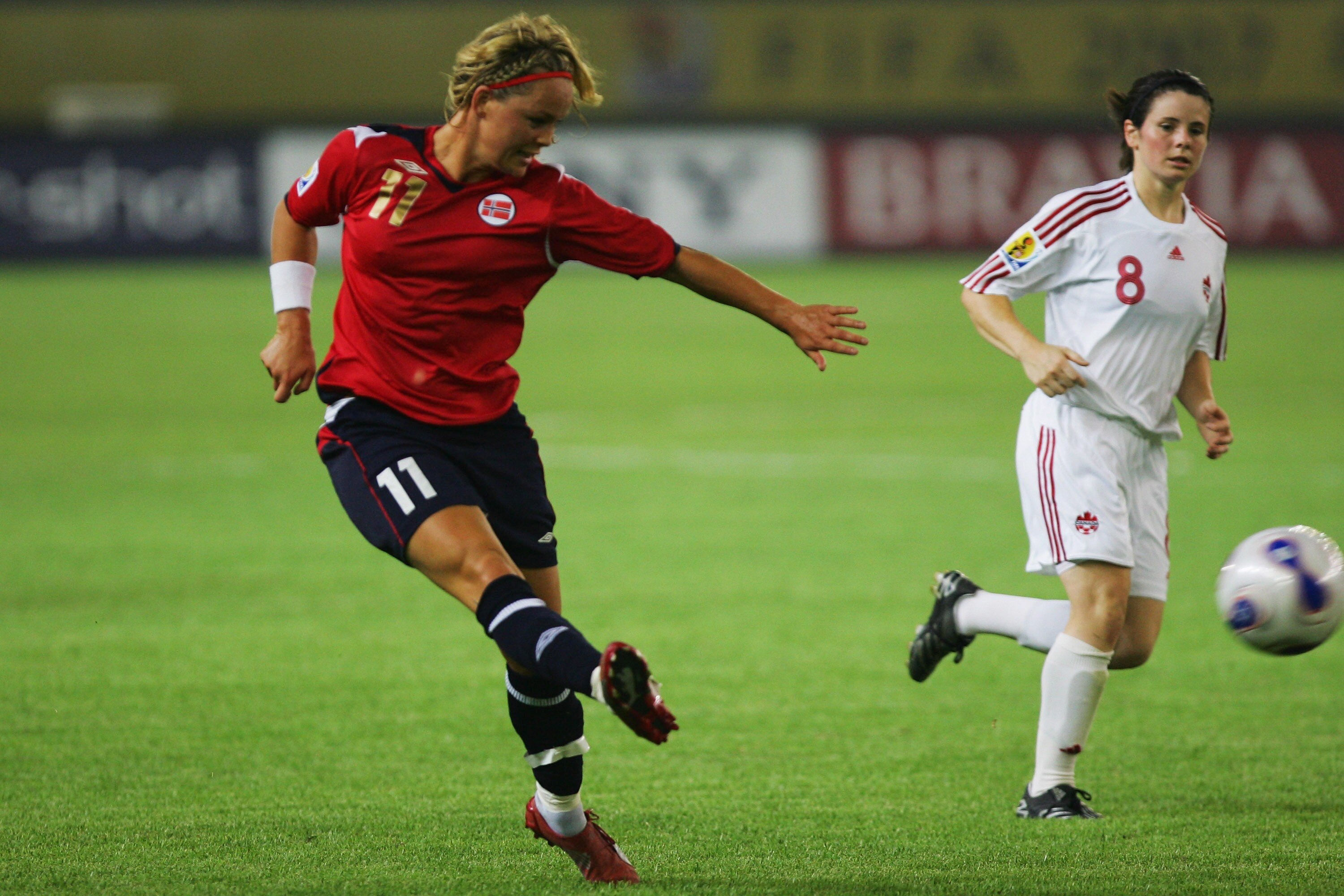 HANGZHOU, CHINA - SEPTEMBER 12:  Leni Larsen Kaurin of Norway fires in a shot  during the FIFA Women's World Cup 2007 Group C match between Norway and Canada at Hangzhou Dragon Stadium on September 12, 2007 in Hangzhou, Zhejiang province of China. (Photo
