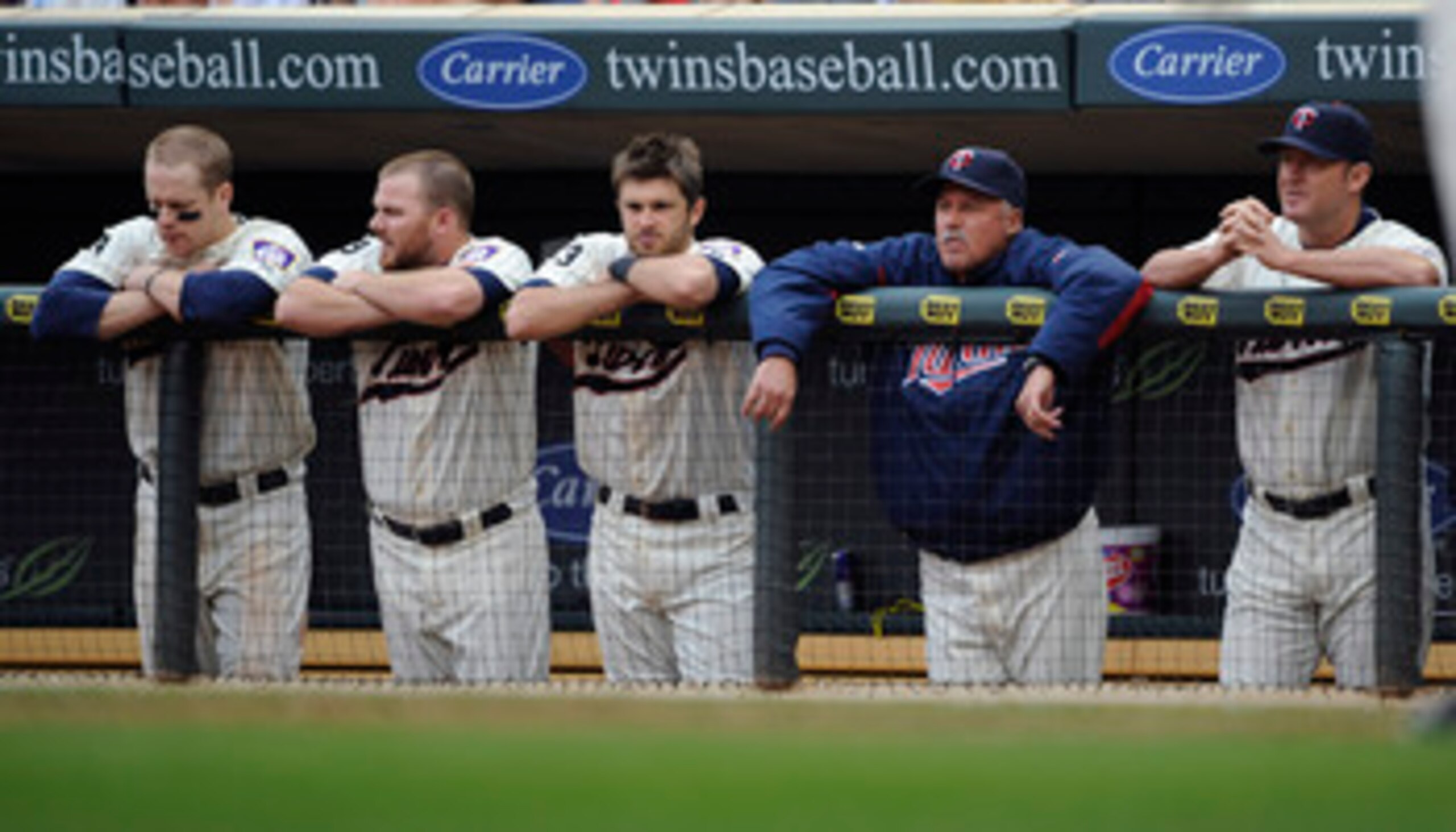 MINNEAPOLIS, MN - MAY 29: Justin Morneau #33 (L), Jason Kubel #16, Drew Butera #41, pitching coach Rick Anderson #40 and Jim Thome #25 of the Minnesota Twins during the ninth inning of their game against the Los Angeles Angels of Anaheim on May 29, 2011 a